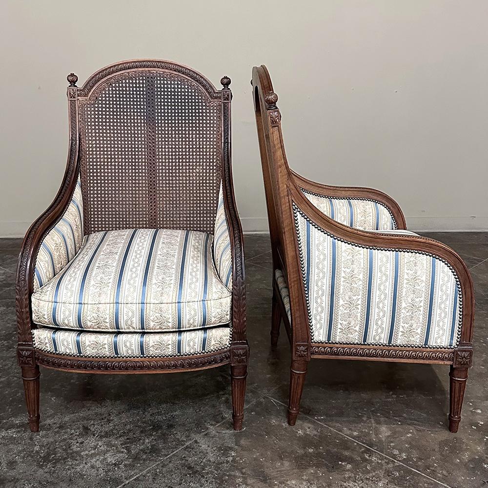 20th Century Pair Antique French Louis XVI Walnut Upholstered Bergeres ~ Armchairs For Sale