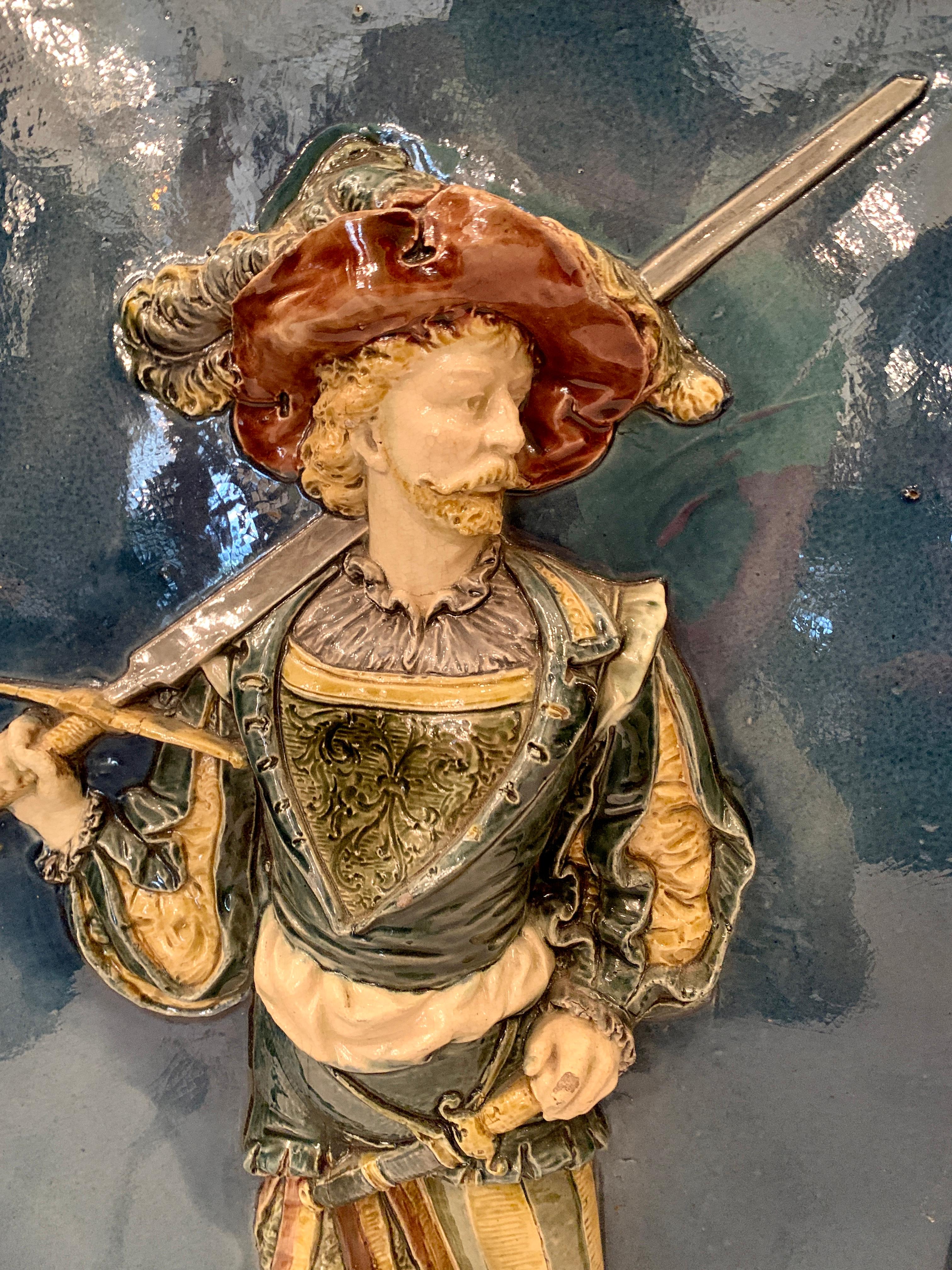 Early 20th Century Pair Antique French Majolica High Relief Plaques, Louis XIV Musketeers, Ca. 1900