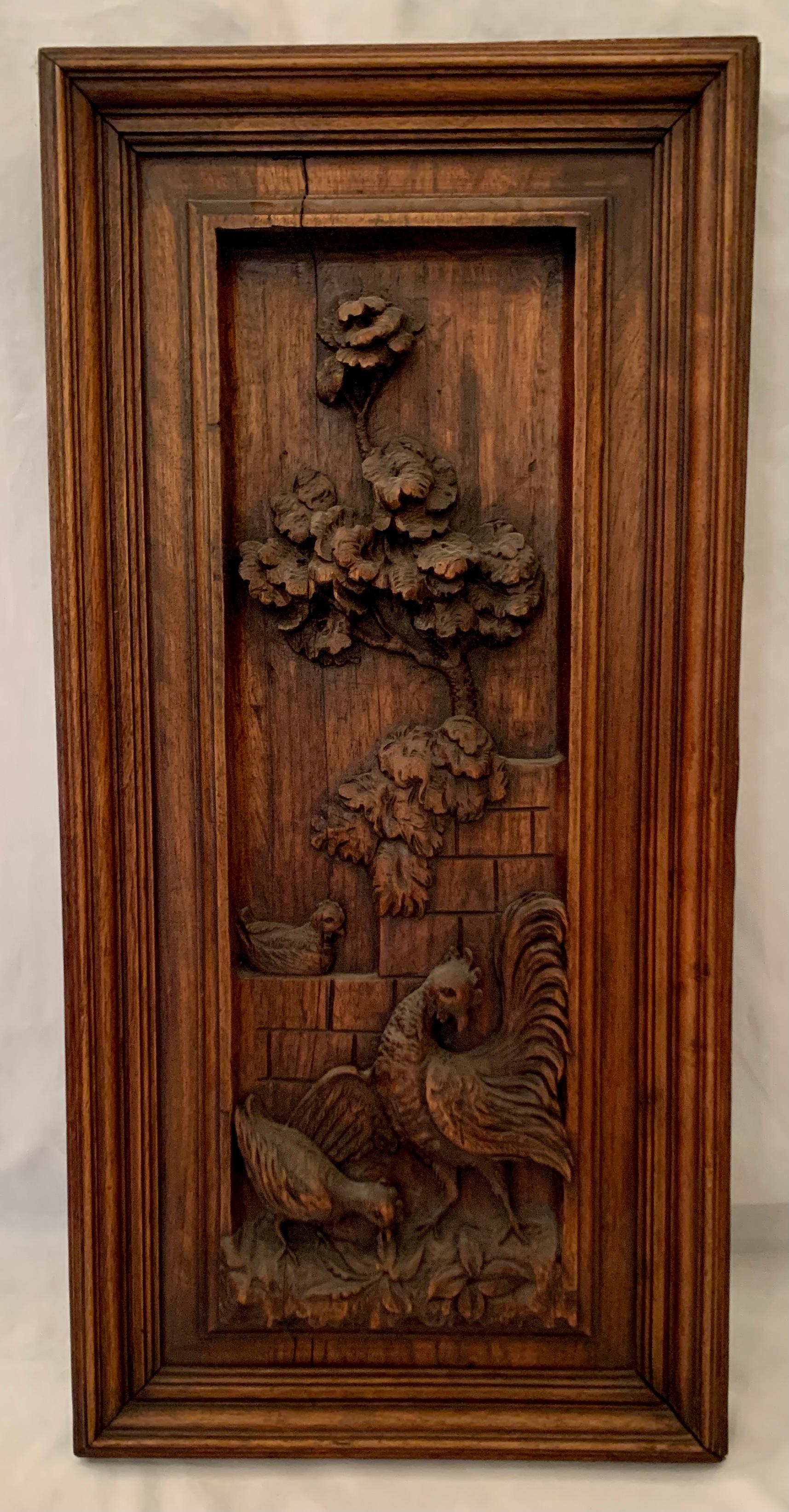 Pair antique French Provincial carved walnut wall plaques, Circa 1890-1900.