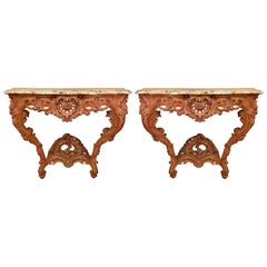 Paire d'anciennes tables consoles en chêne sculpté de la Régence française, vers 1880.