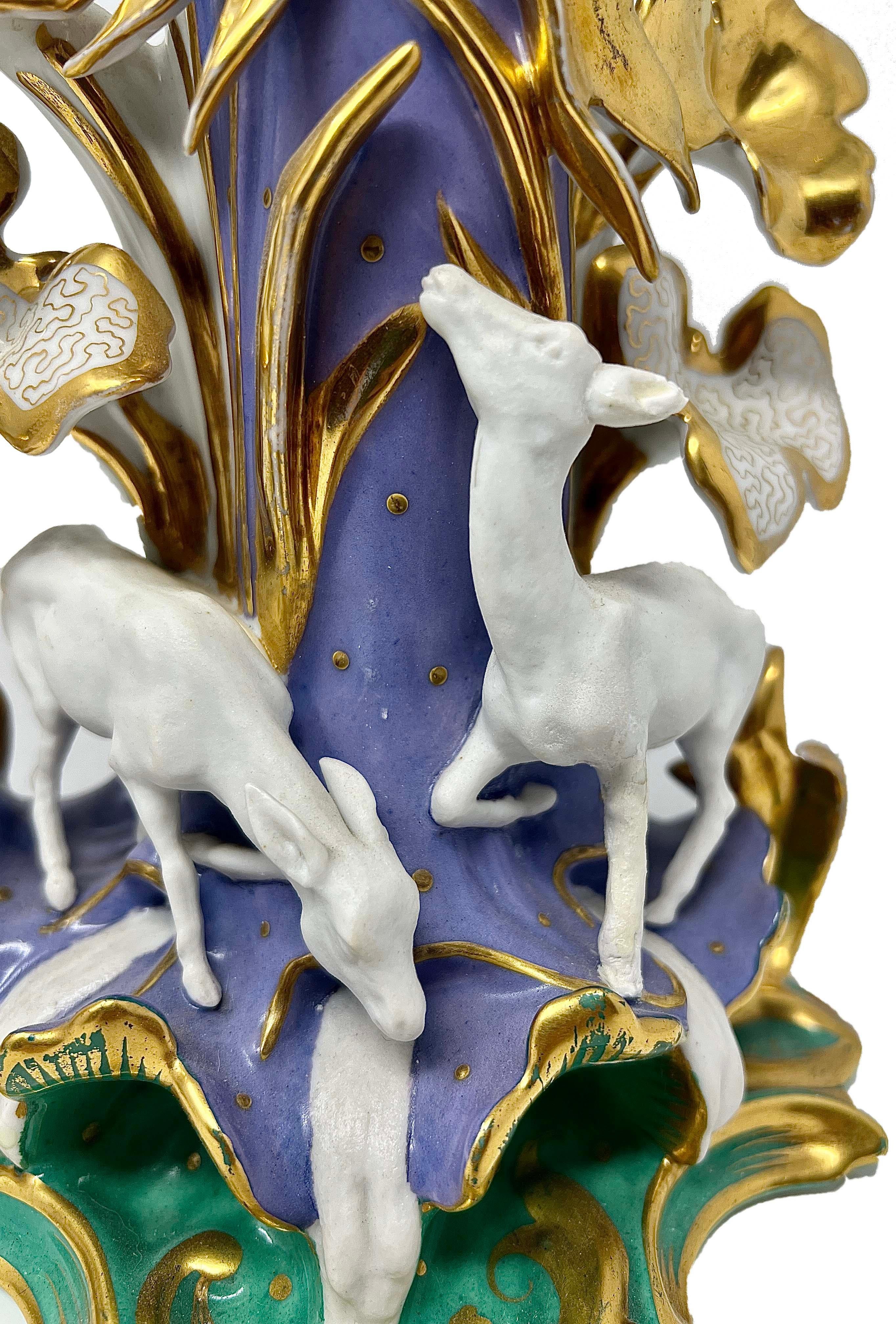 Pair Antique French Vieux Paris Porcelain Lavender Vases, Circa 1840-1860.
Hand-Painted colors of lavender, green and gold with flora and fauna.