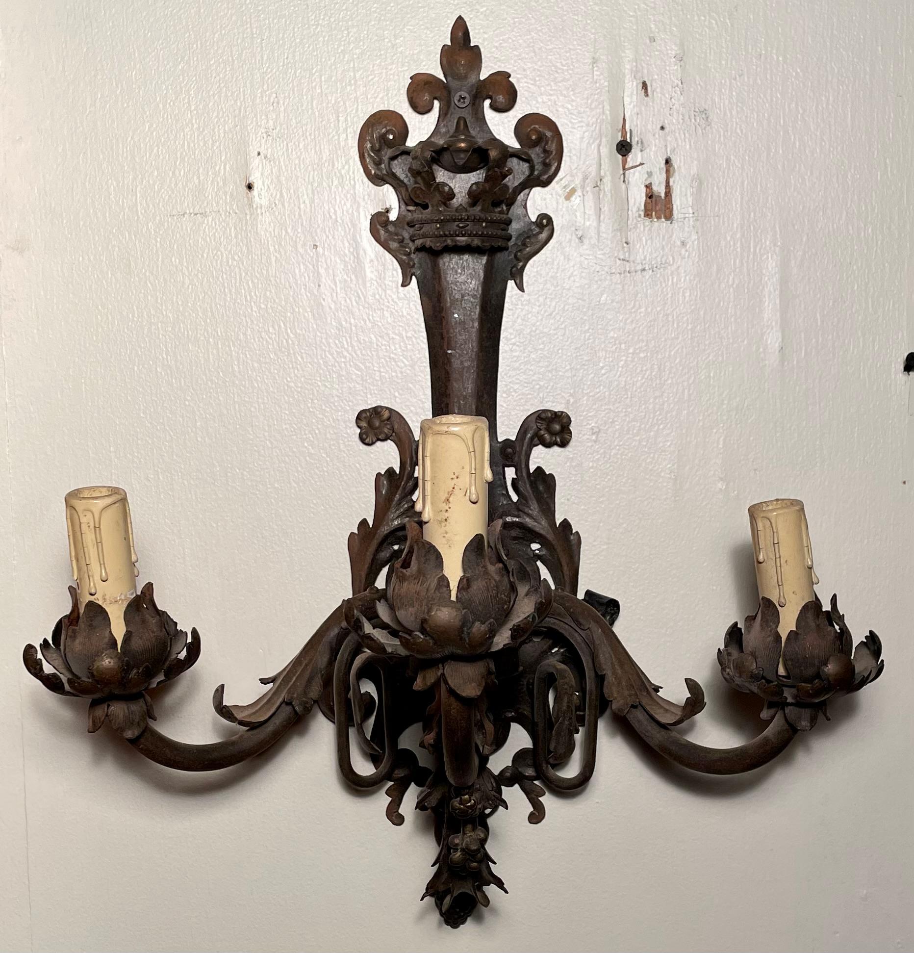Pair antique French wrought iron and tole 3-light wall sconces, Circa 1890's.