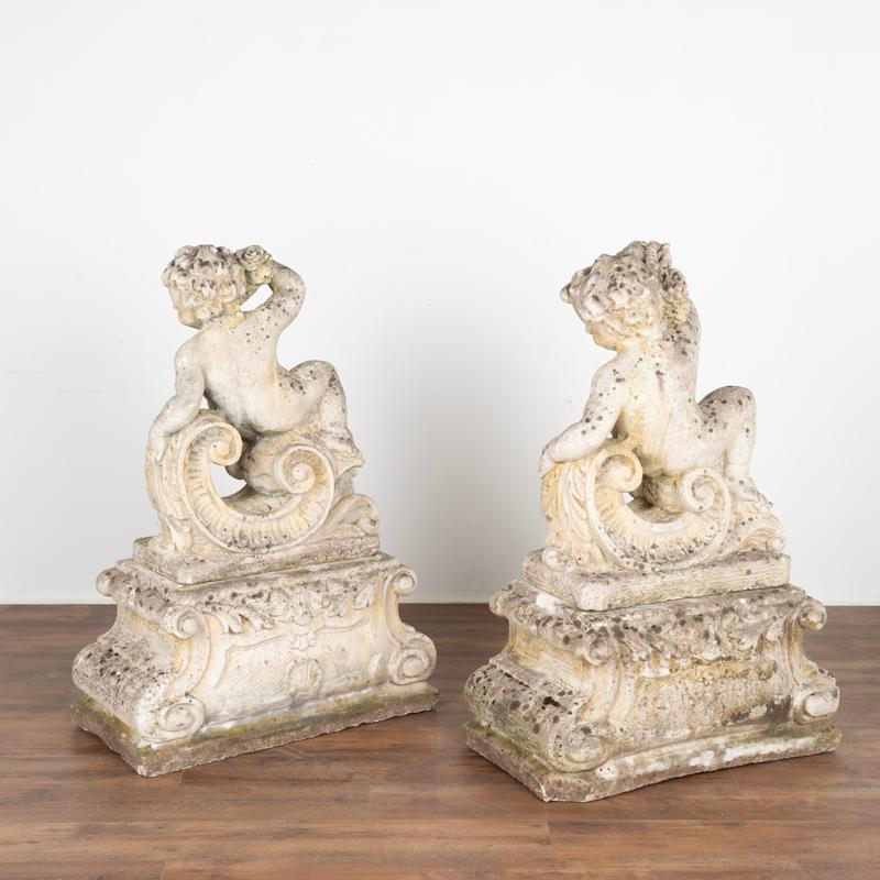 French Pair, Antique Garden Cherub Putti Statues with Flowers and Grapes For Sale