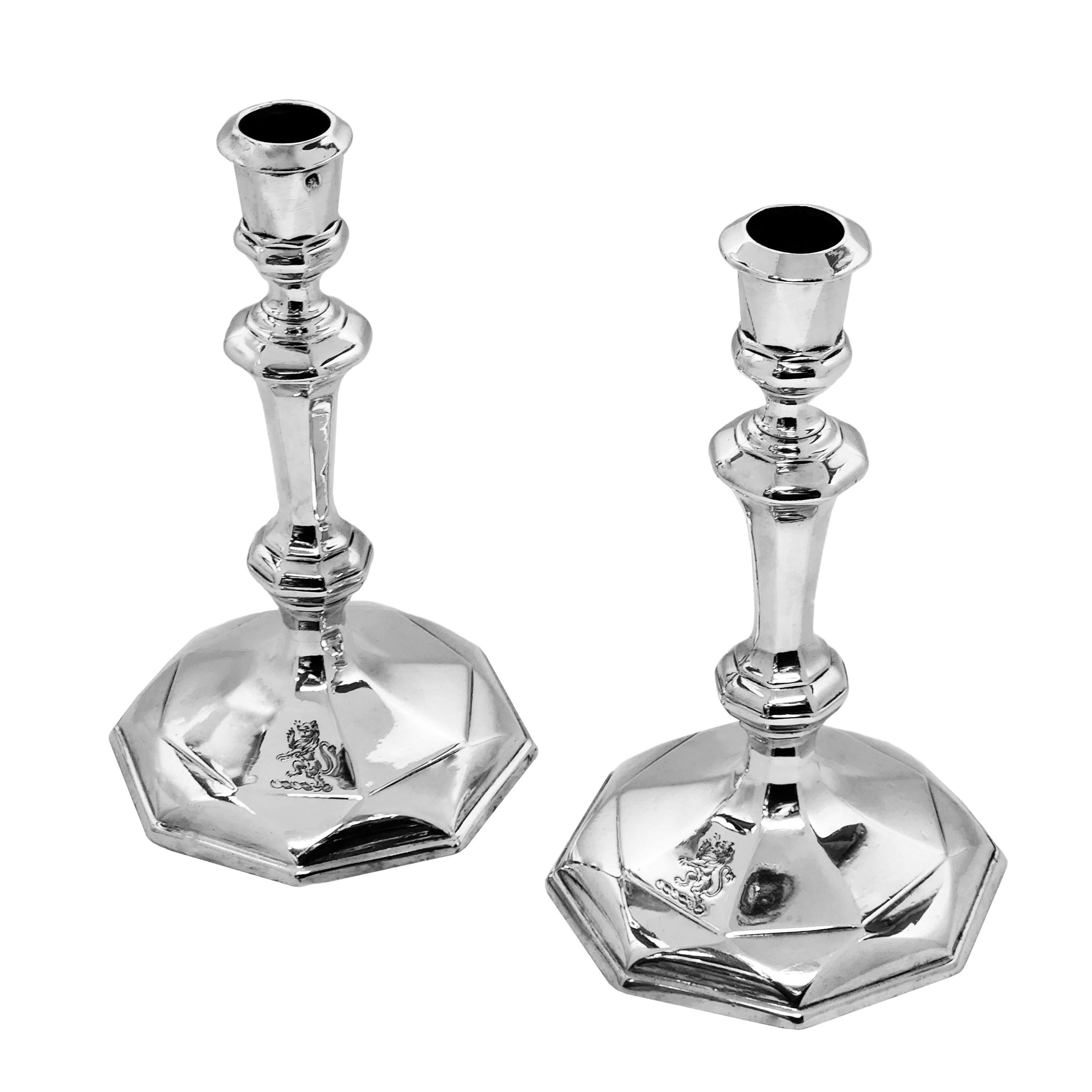 A pair of Antique George I Sterling Silver Candlesticks with elegant shaped octagonal bases and octagonal columns. These Cast Silver Candlesticks are of an excellent weight.

Made in London, England in 1718 by Matthew Cooper.

Approx. Weight – 764g
