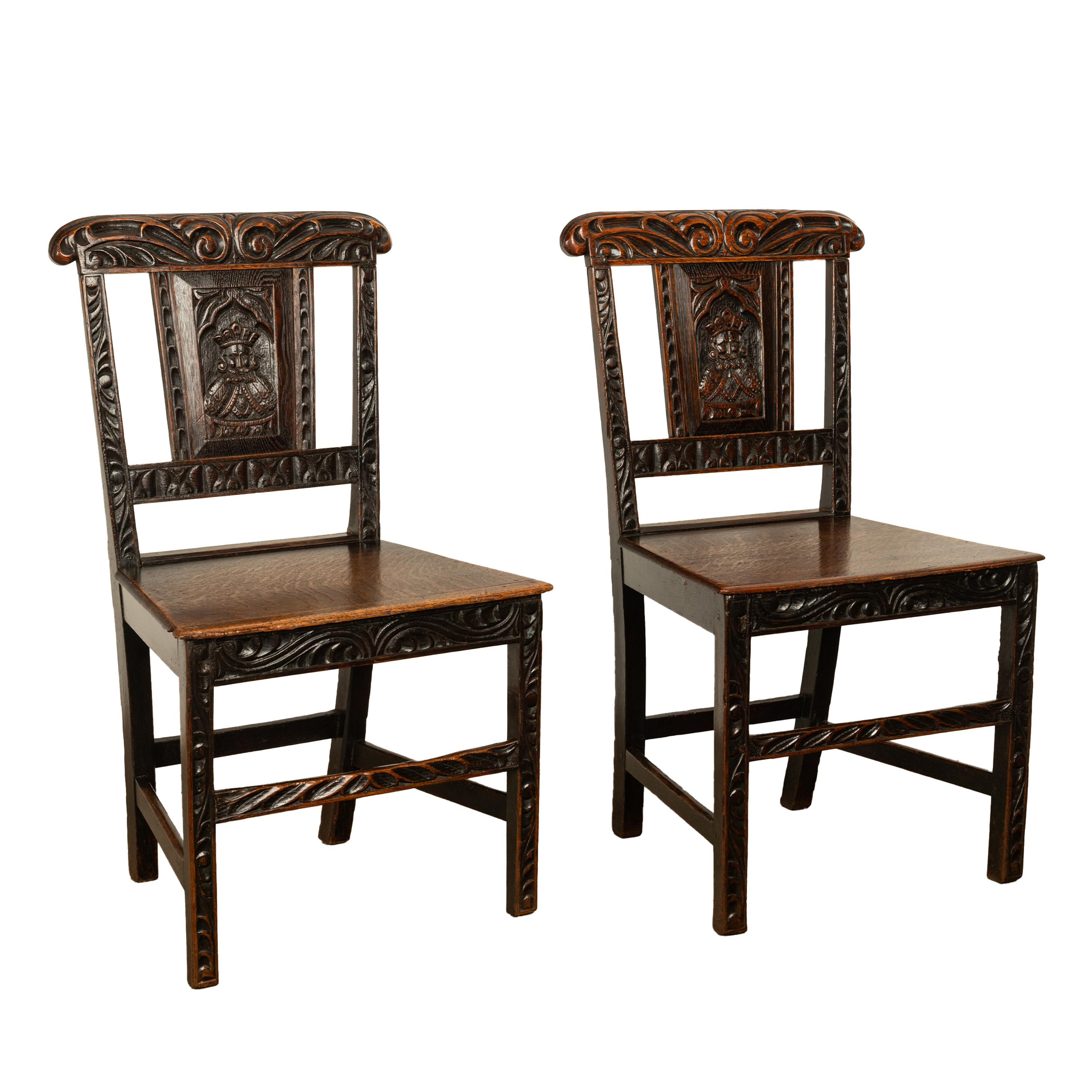 English Pair Antique Georgian Carved Oak Country Medieval Side Chairs King's Head 1760 For Sale
