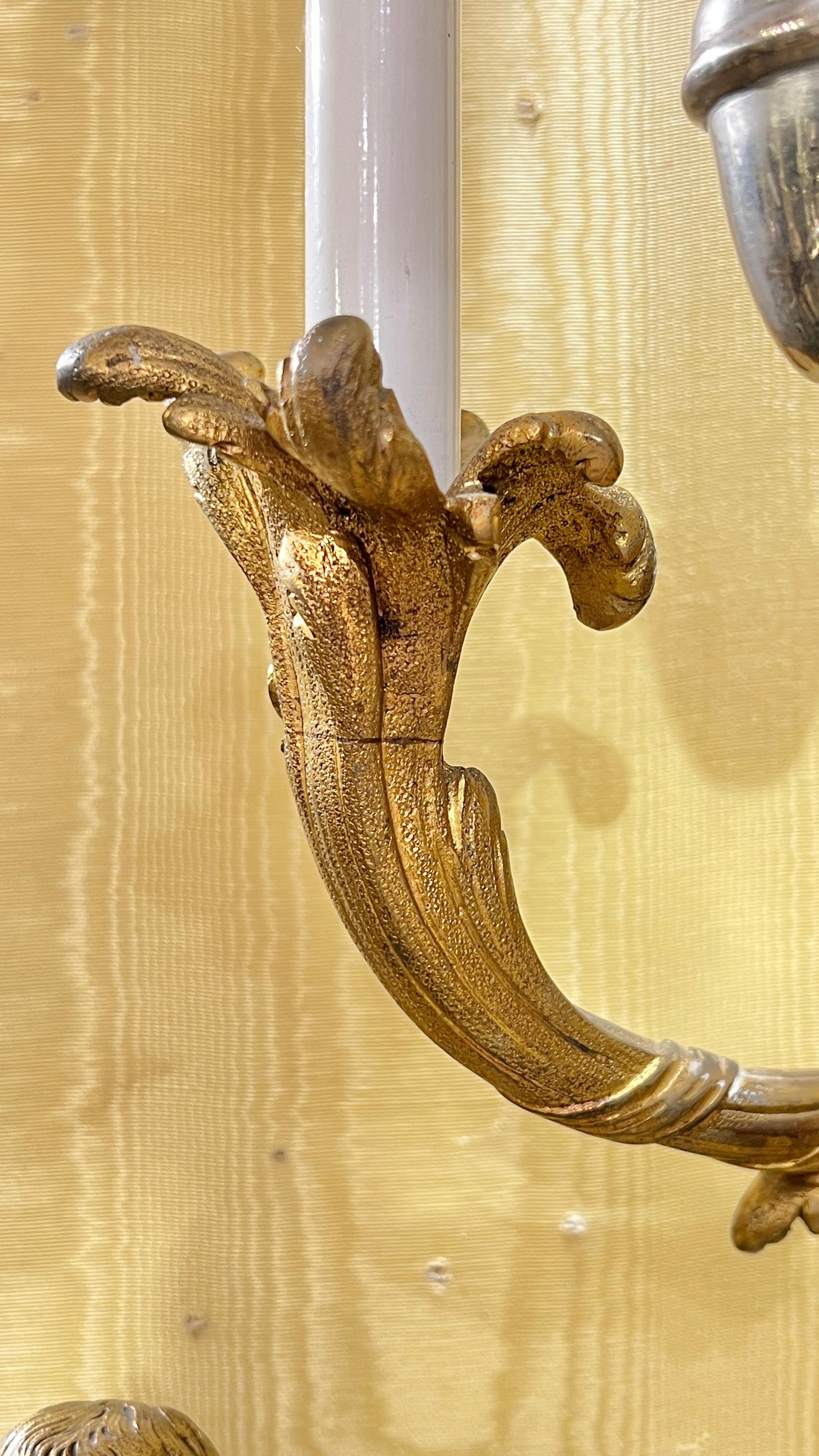 Pair Antique Gilt Bronze Three-Light Sconces in French Louis XV XVI Style In Good Condition For Sale In New York, NY