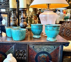 Coppia di vasi antichi in terracotta smaltata