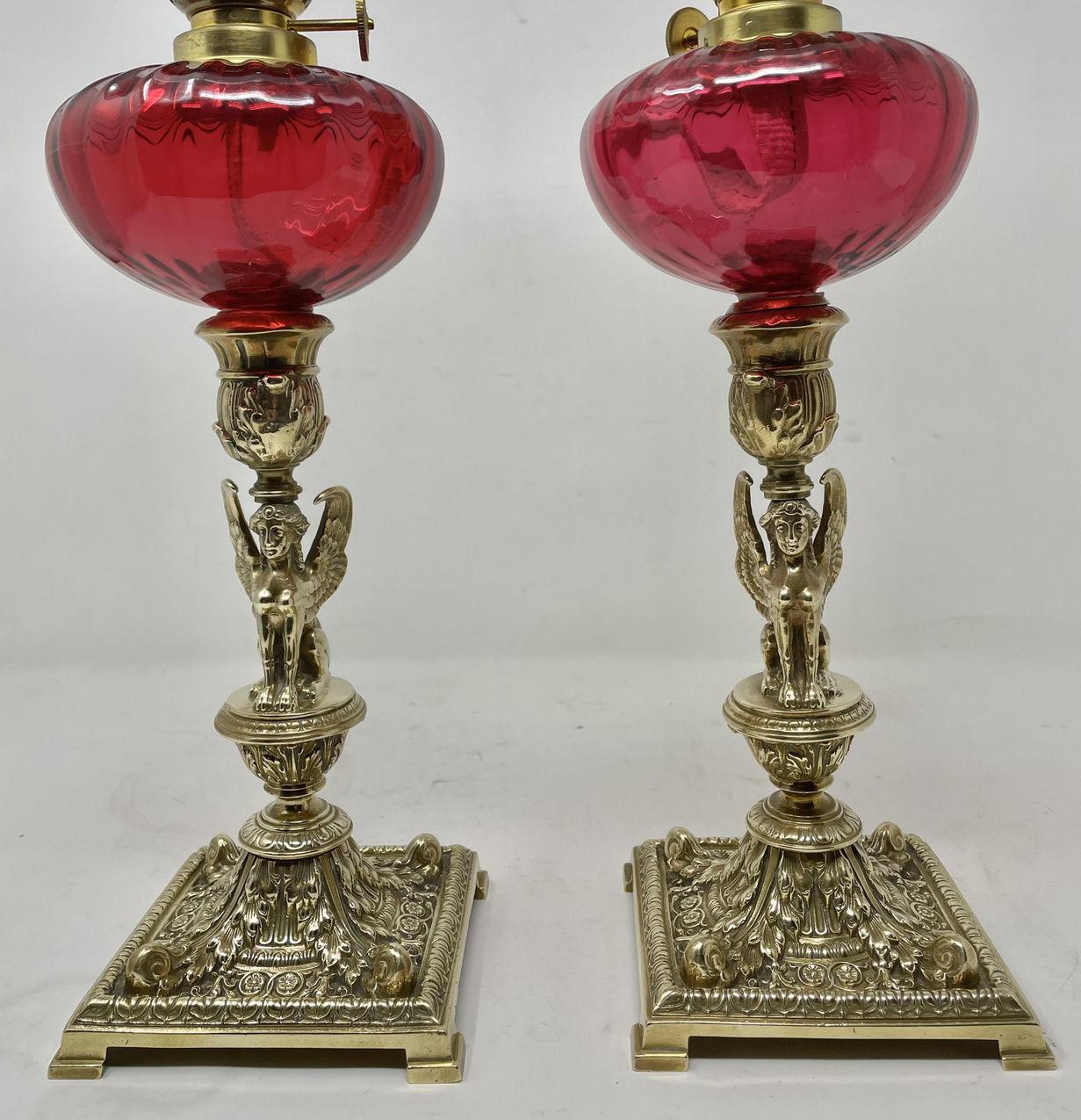 Pair Antique Grand Tour French Brass Egyptian Sphinx Oil Lamps Cranberry Glass In Good Condition In Dublin, Ireland
