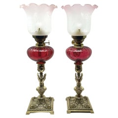 Pair Antique Grand Tour French Brass Egyptian Sphinx Oil Lamps Cranberry Glass