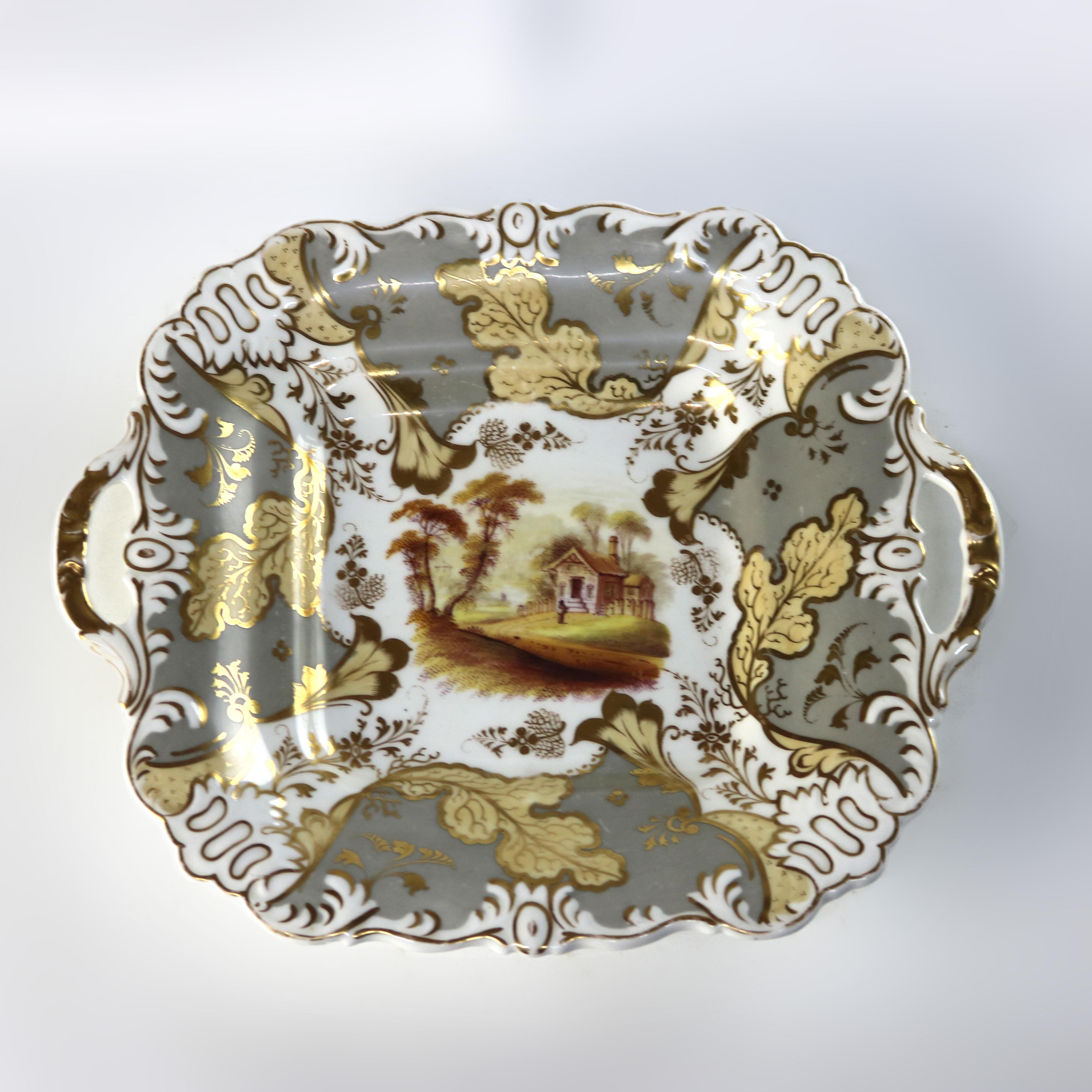 Coppia di antichi piatti da portata in porcellana dipinti a mano e dorati con doppio manico C1890

Misure: 9