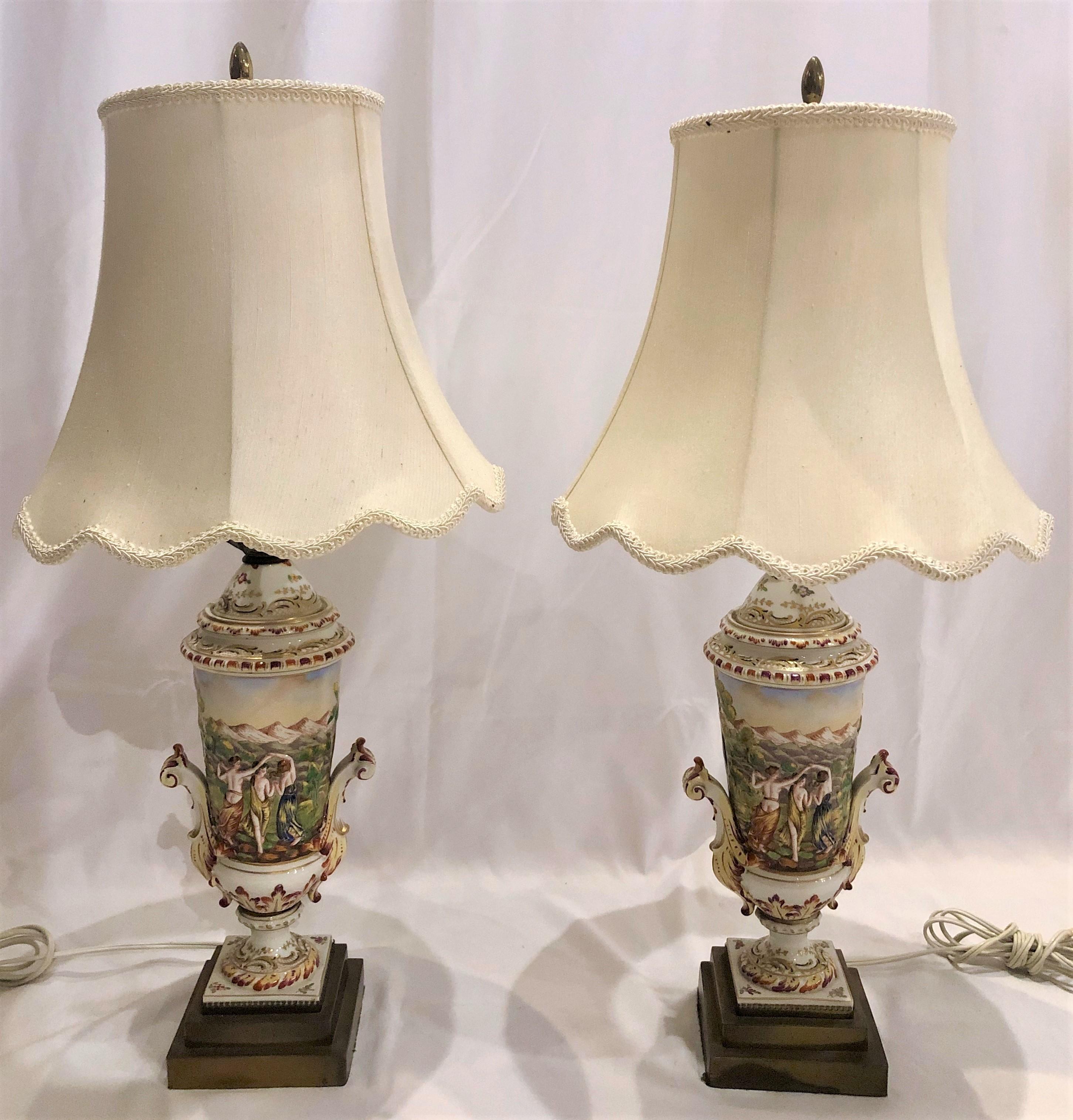 Pair of antique Italian Capo Di Monte porcelain urns made into lamps, circa 1890.
Measures: Base: 4 1/2