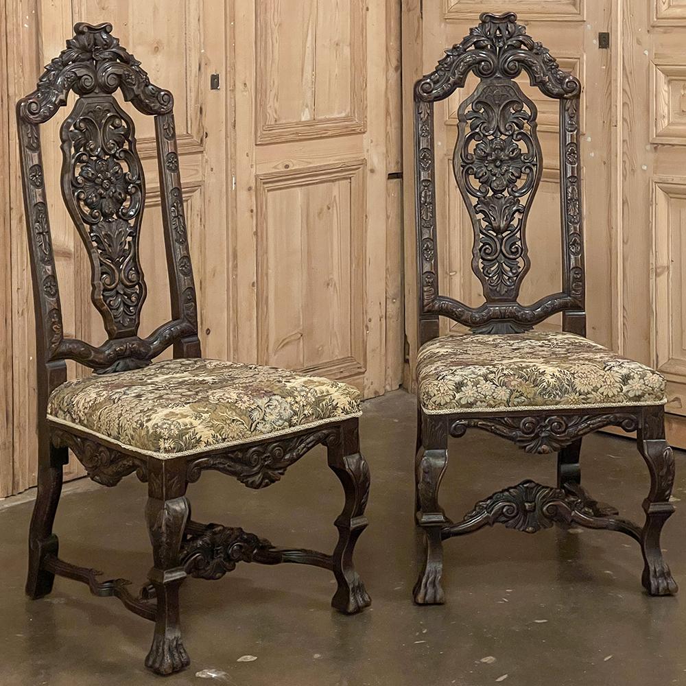 Pair antique Italian Renaissance side chairs are elaborate expressions of the style, celebrating the beauty and majesty of earthly wonders in sculpted wood. The high, arched seatbacks are contoured for comfort, and feature foliates, scrollwork,