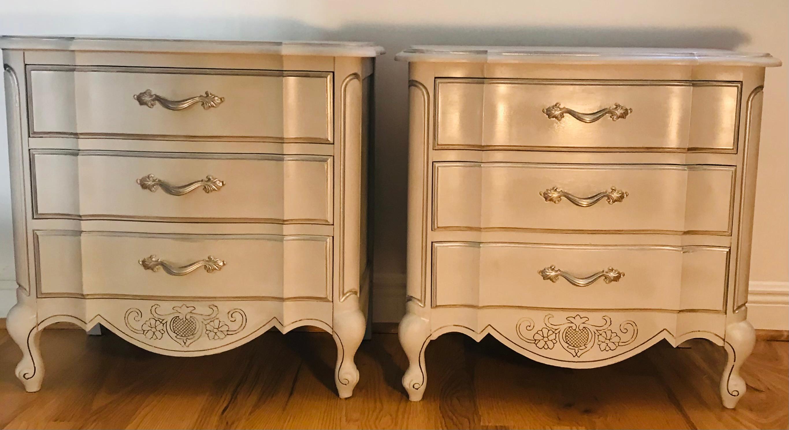 Elegant pair of three drawers small commodes nightstands painted gray with silver trim. Original hardware. Profiled legs. Floral invited decoration. Great condition.