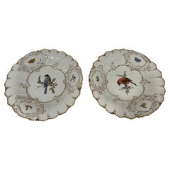 Pareja, Cargadores antiguos de porcelana de Meissen con incrustaciones ornamentales y doradas