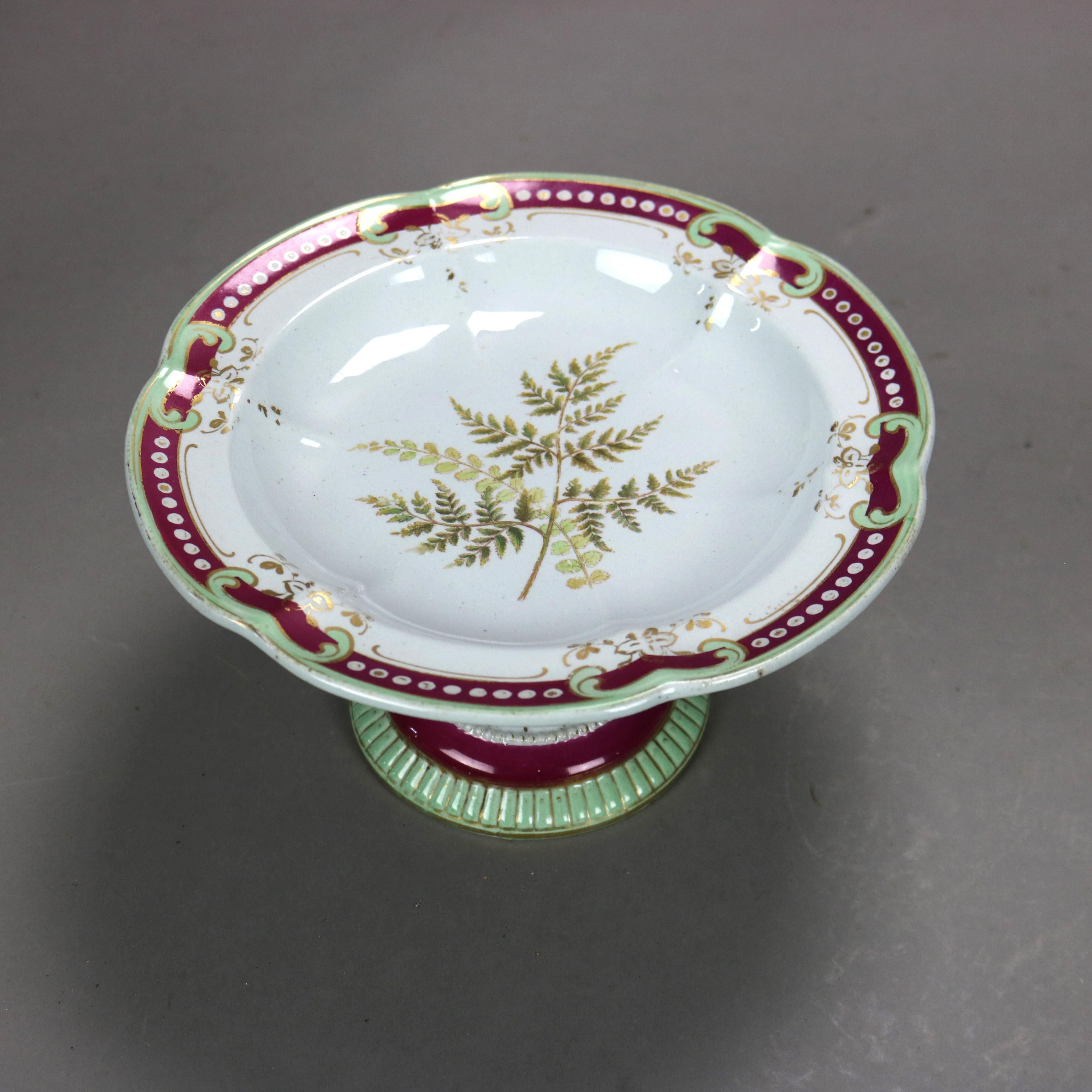 Coppia di antichi vassoi in porcellana Old Paris della scuola di Meissen con felce C1890

Misure: 5'' H. x 9,5'' L. x 9,5'' P.
