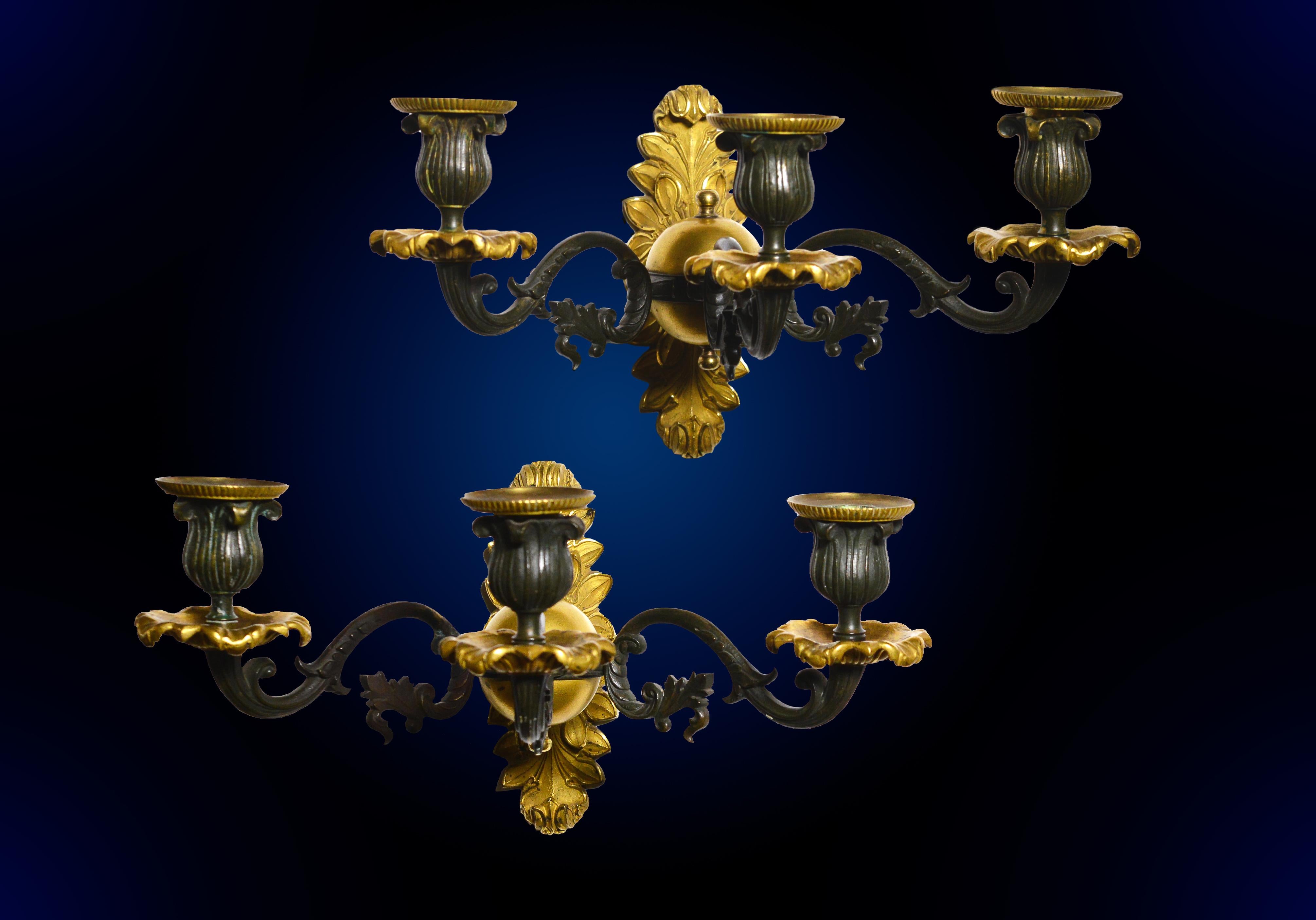 Very Good stylish and fancy fine detail hand chased bronze and gold-plated (ormolu) sconces in the style of Neoclassicism (also known as Empire style). Made in 19th century in Continental Europe.
Size app.: 17 cm (roughly 6,7 in) high, 33 cm