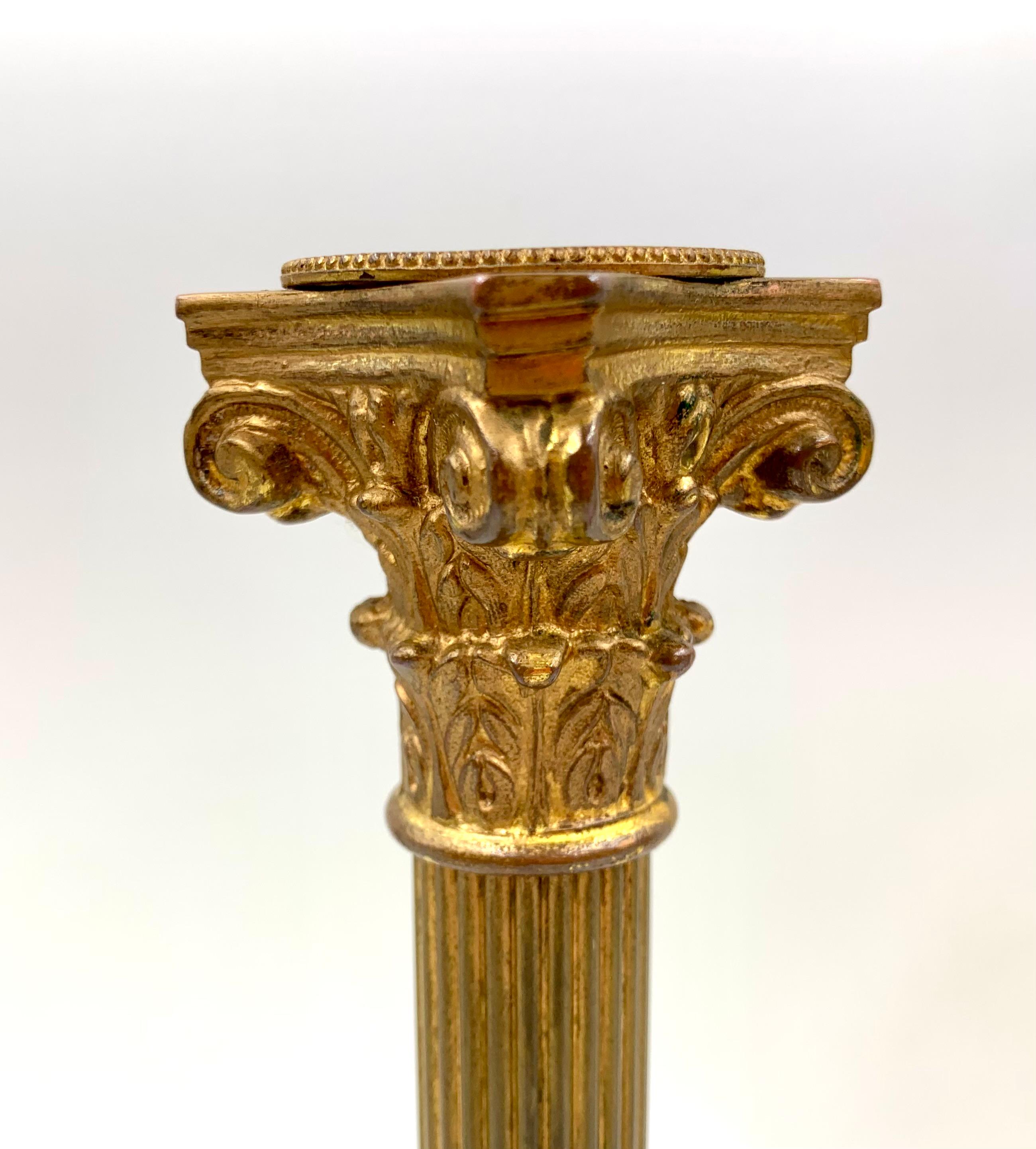 XX secolo Pair Antique Neoclassical Style Corinthian Column Gilt Bronze Candle Holders in vendita