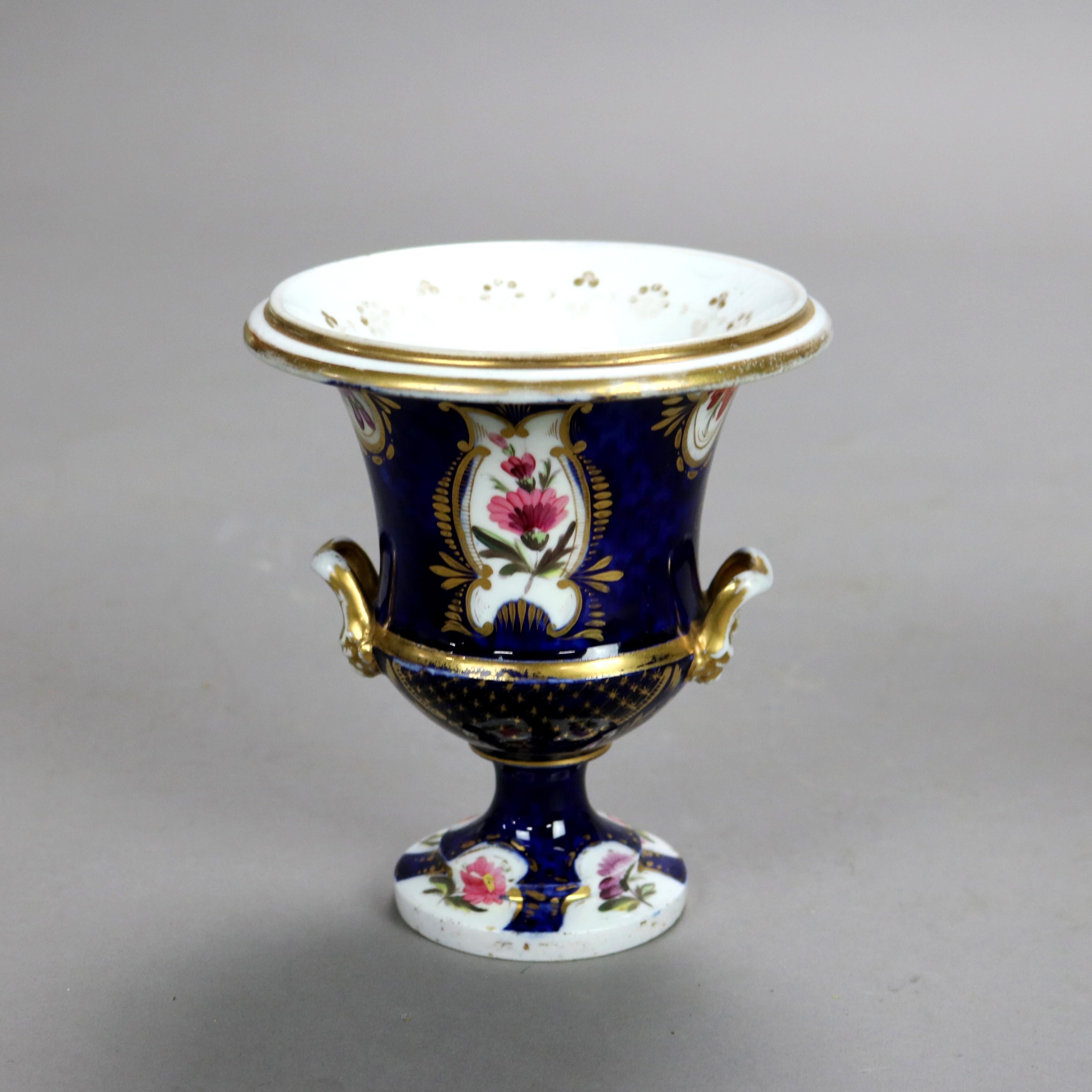Pair Antique Old Paris Cobalt Blue Porcelain Urns with Floral Design Circa 1880

Measures- 5.25