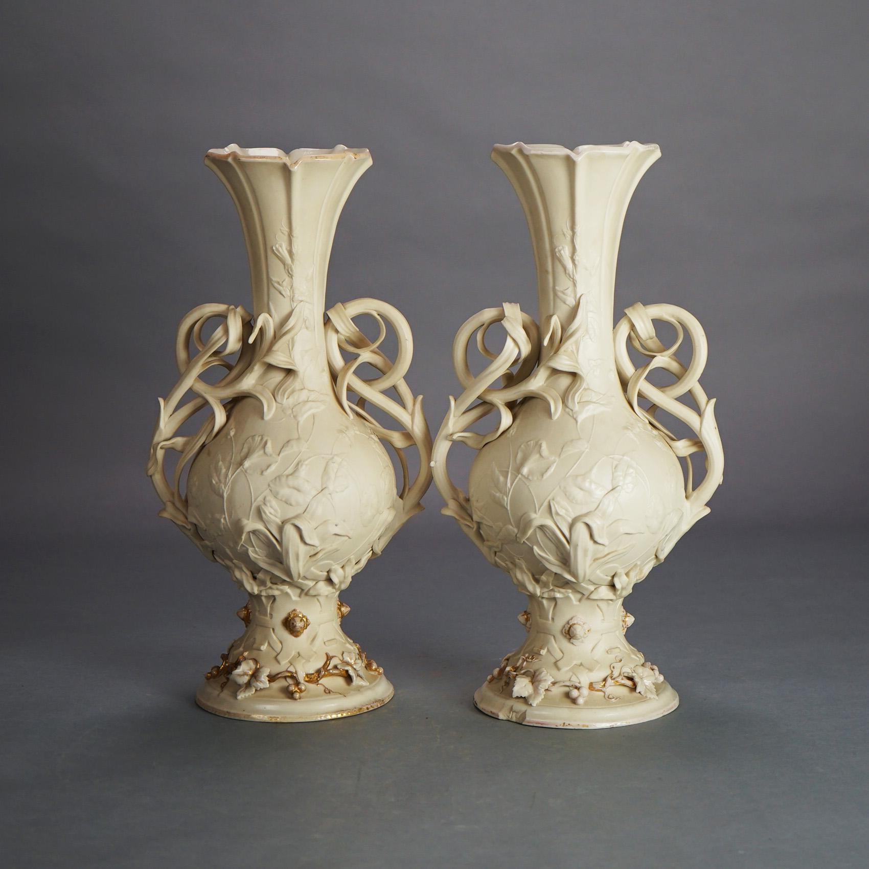 Pair Antique Parian Porcelain Rococo Style Double Handled Mantle Vases with Foliate, Grape & Vine Elements C1890

Measures - 16