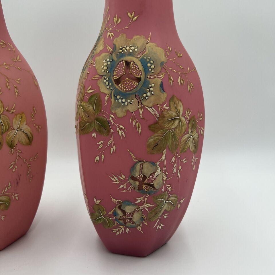 Pair, Antique Pink Bristol Glass Painted Enamel Floral Hexagonal Vases.


12.5” h x 6” w


Superb pieces with heavy enamel decoration.


Note: very minor chip to one vase rim. Other vase with 2 chips as photographed