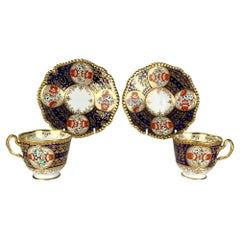 Paar antike Porzellanbecher und Untertassen von FBB Worcester, handbemalt, um 1820