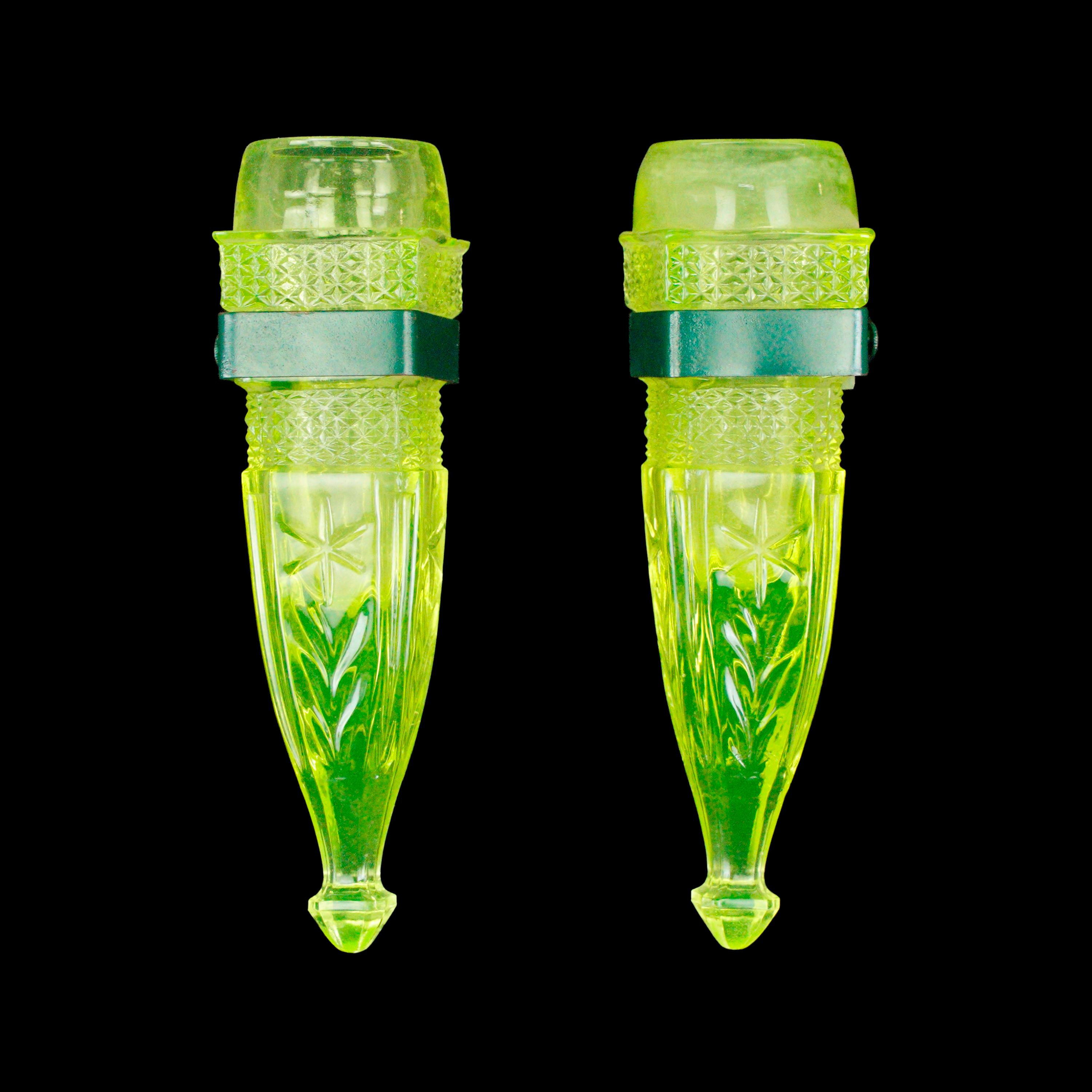 Rare pair of antique green uranium glass and green painted steel automotive vases. Good condition with appropriate wear from age. Priced as a pair. Cleaned and restored. Please note, this item is located in our Scranton, PA location.