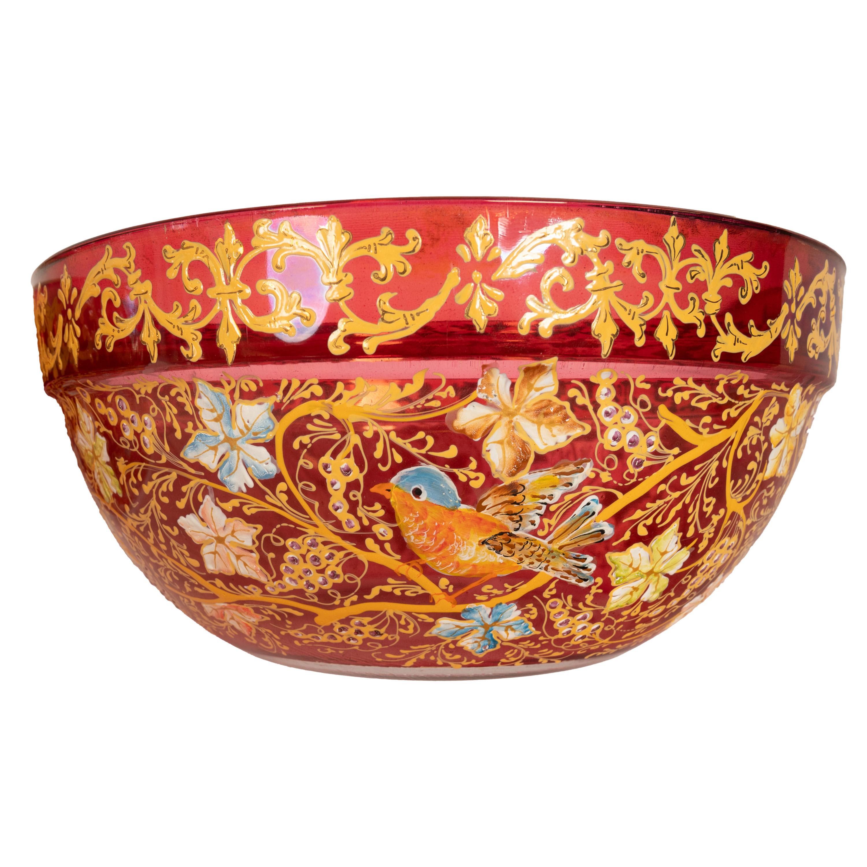 A pair of antique red enameled art glass bowls made for the Islamic/Persian market, made in France or Bohemia, circa 1900.
Each bowl with a pronounced band to the top, finely enameled with foliate decoration, the base of each bowl is finely