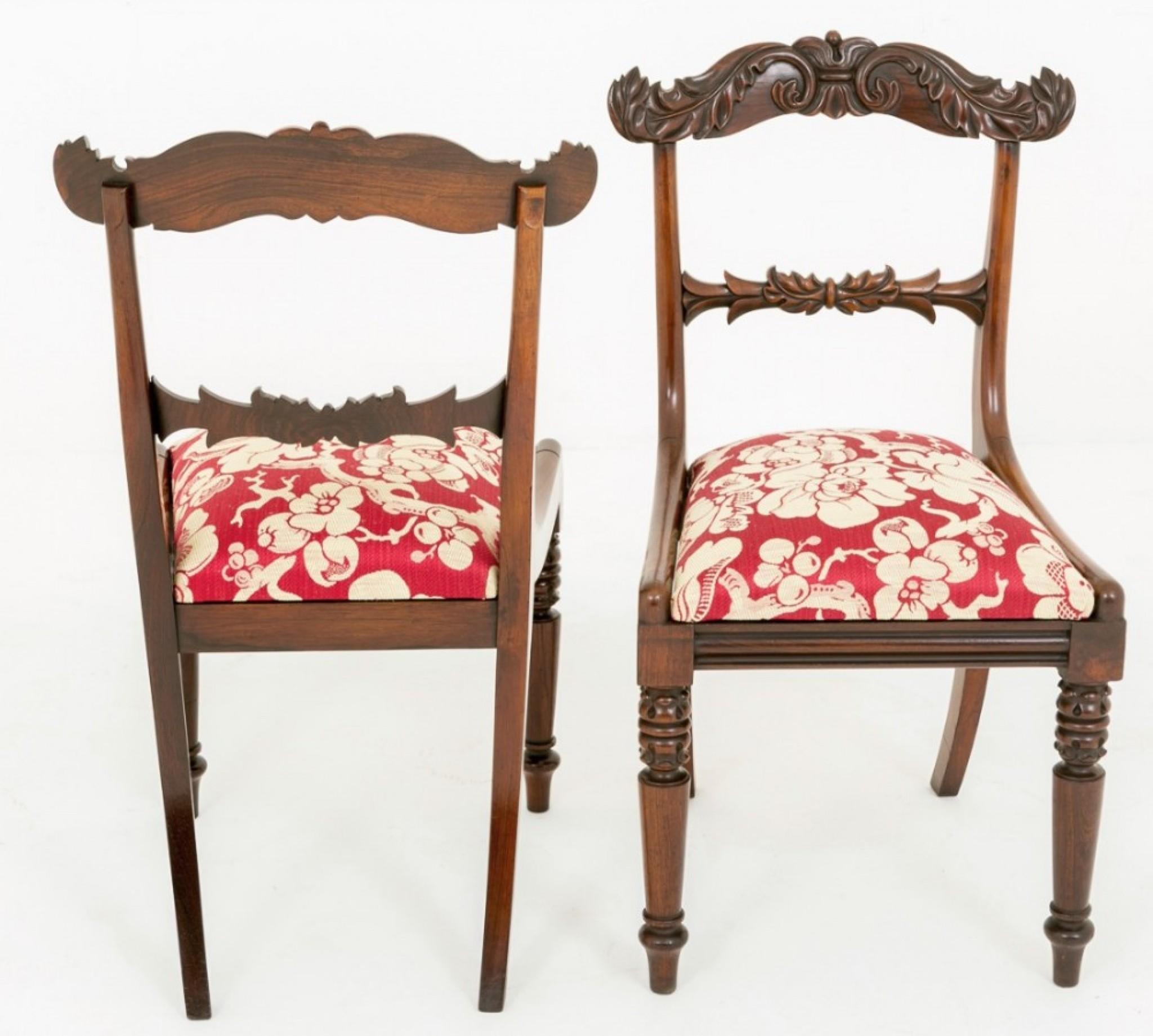 Stunning Pair of Regency Rosewood Chairs.
These chairs having ring turned and carved front legs.
The centre rail of typical Regency design and the wonderful top rail featuring deep carved leaves etc.
The lift out seats having been recently re