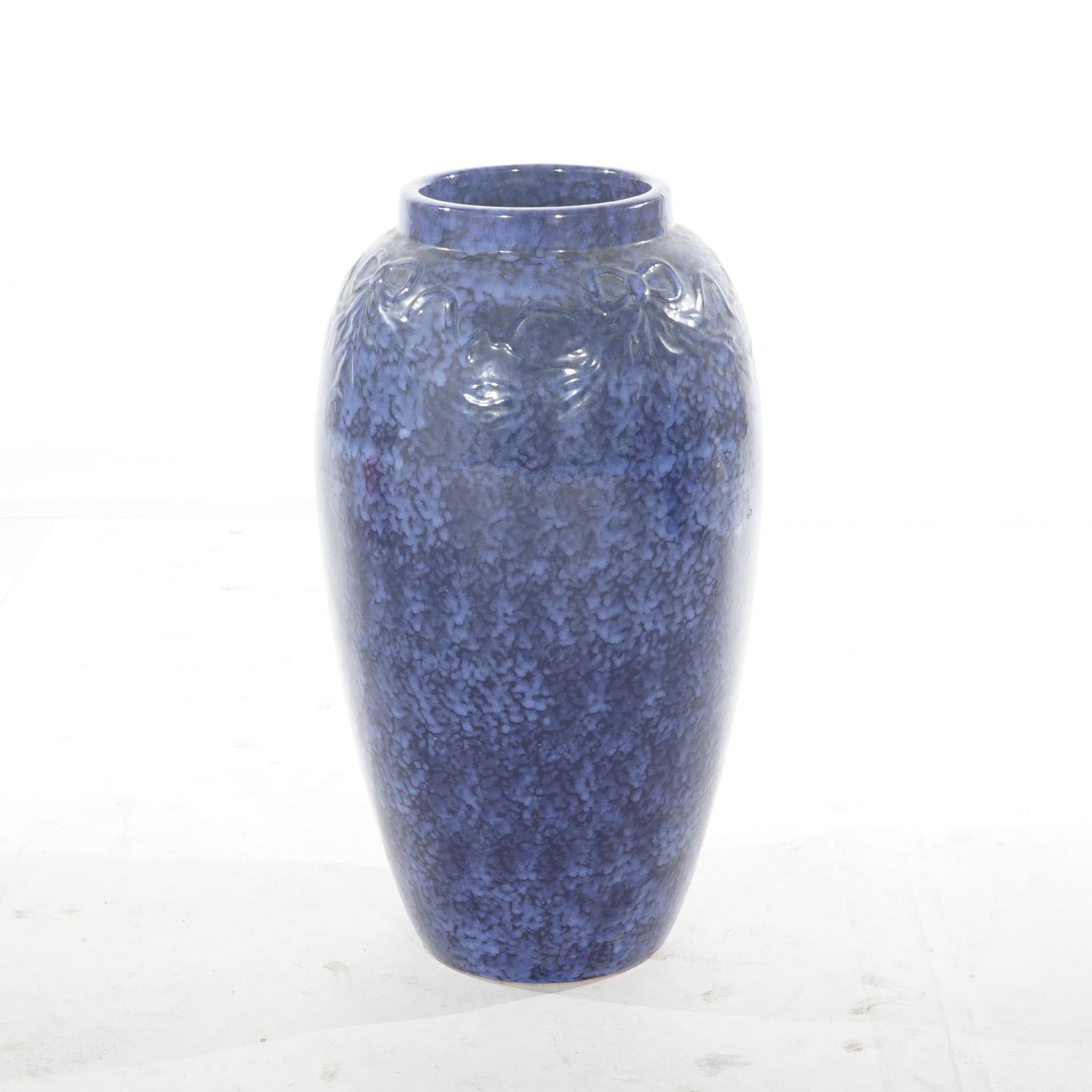 20th Century Pair Antique Roseville Art Pottery Floral Embossed Vases with Mottled Blue Glaze For Sale