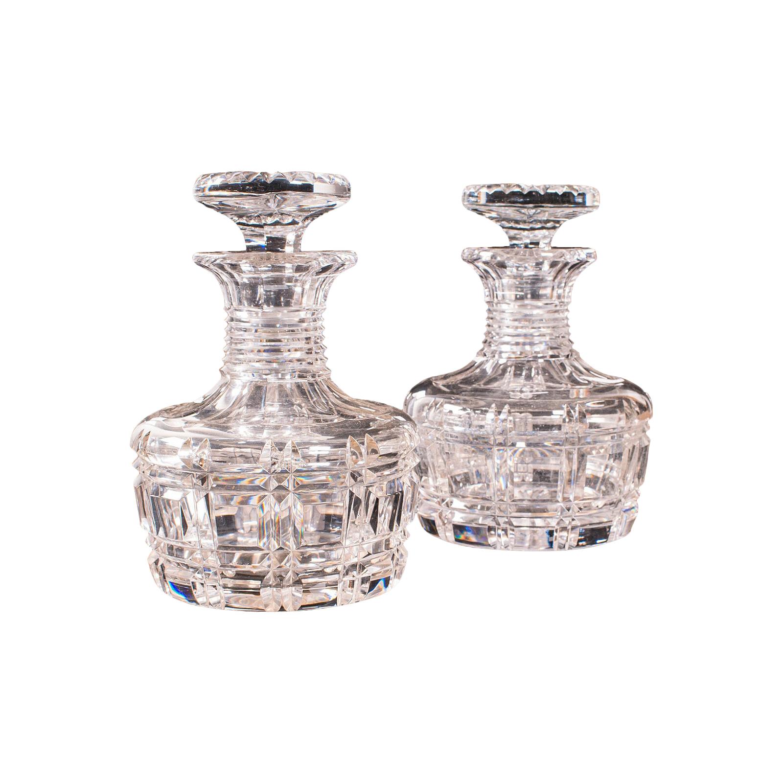 https://a.1stdibscdn.com/pair-antique-sherry-decanters-english-glass-spirit-liquor-flask-edwardian-for-sale/1121189/f_239496721622271753435/23949672_master.jpg