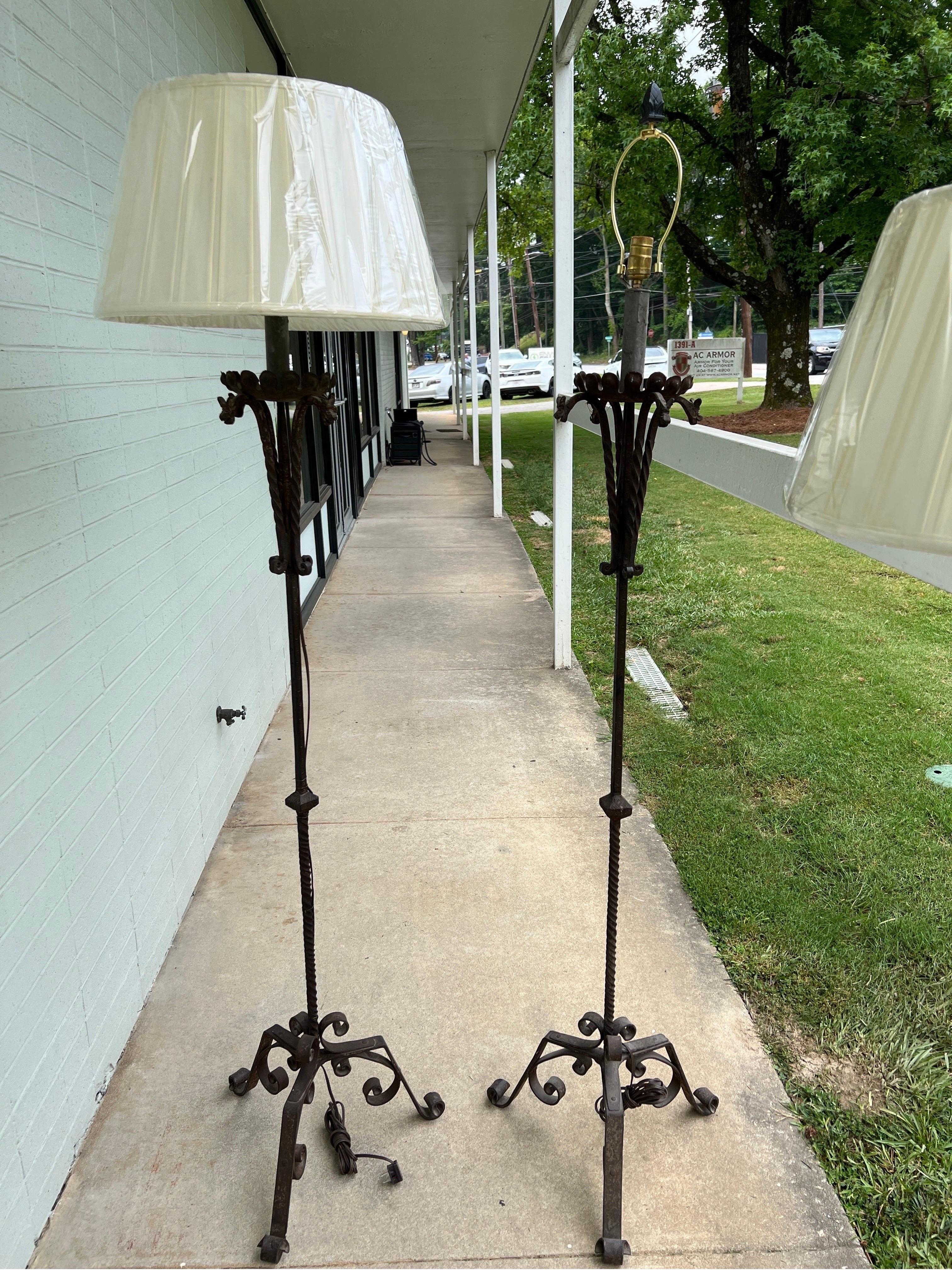 Pair, Antique Spanish Giacometti Style Sculptural Iron Floor Lamps
These antique Spanish sculptural floor lamps have a Giacometti influence from their curled feet, hand forged stem, dragon heads and distressed finish.