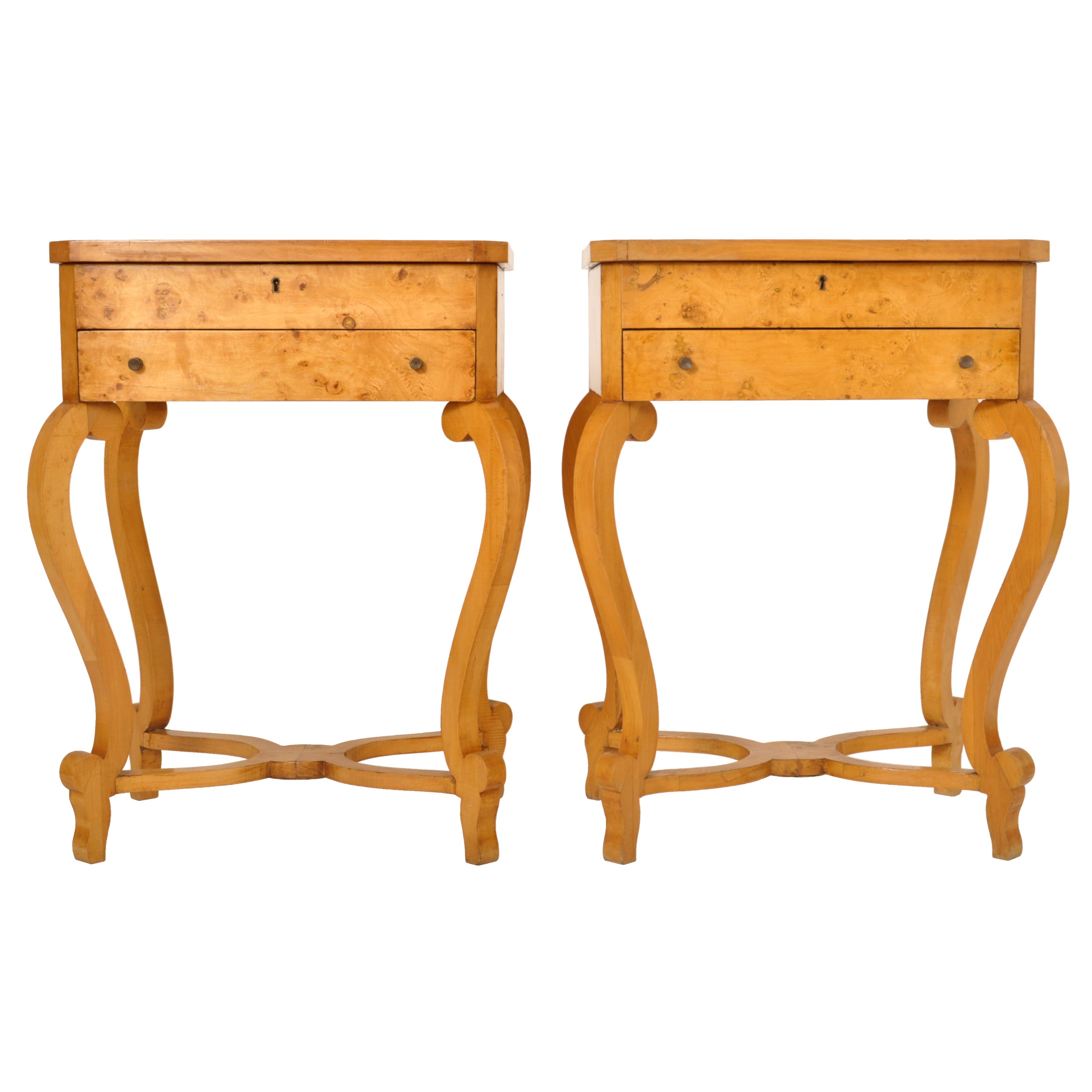 A Fine and stylish pair of Swedish Gold Birch Biedermeier side/dressing tables, nightstands, circa 1890.
Each table having a lift up hinged top with a fitted interior and mirror to the underside and below a single drawer. Each table is raised on