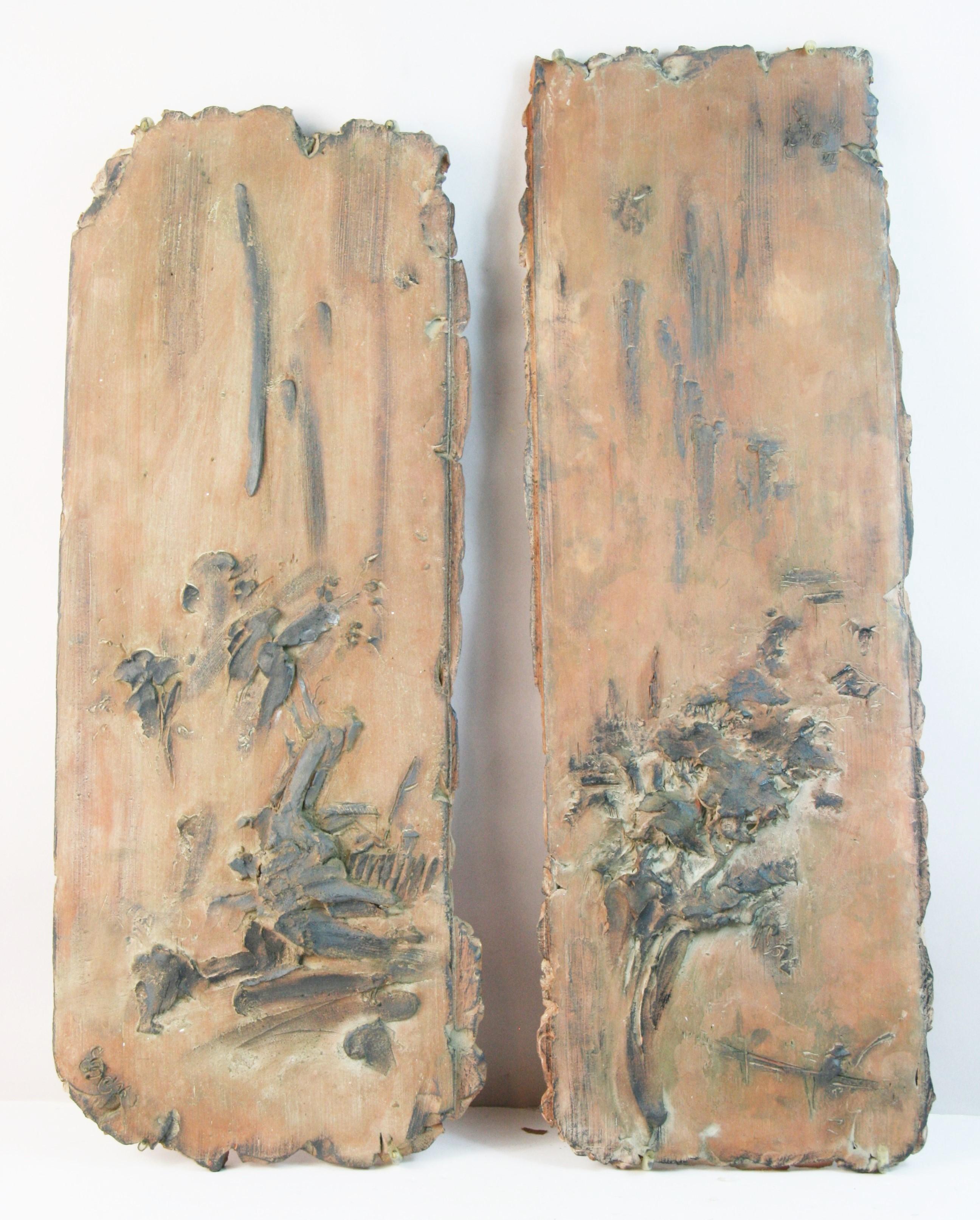 1819 Antique pair hand crafted terracotta wall plaques
one depicting trees with man fishing
two depicting a mountain peak
Has hanging hardware for mounting to wall