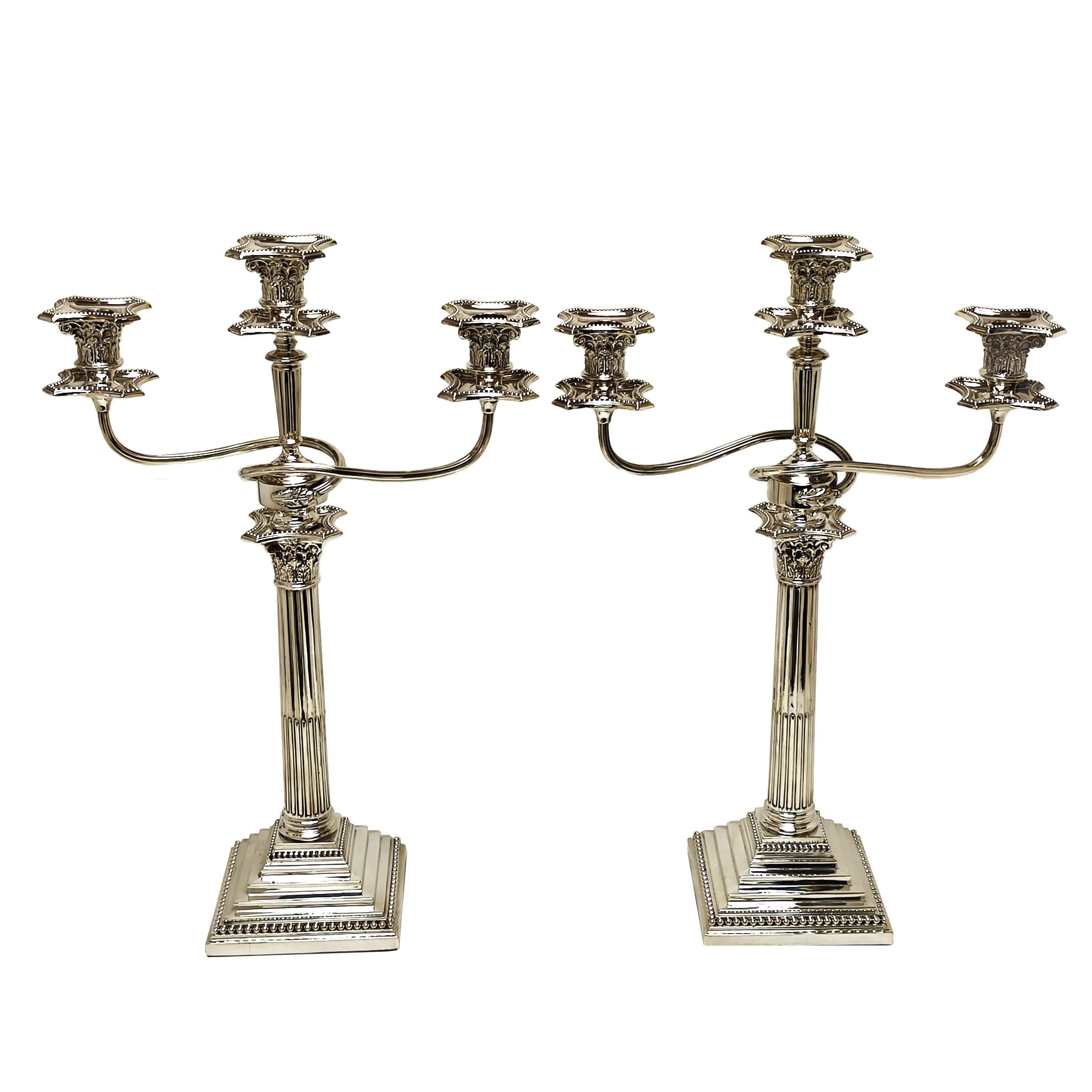 A pair of classic Antique Victorian Silver Candelabra in a traditional Corinthian column style. These Silver Candelabra have removable branches converting them from 3 Light Candelabra to Elegant Corinthian Candlesticks.

Candlesticks made in