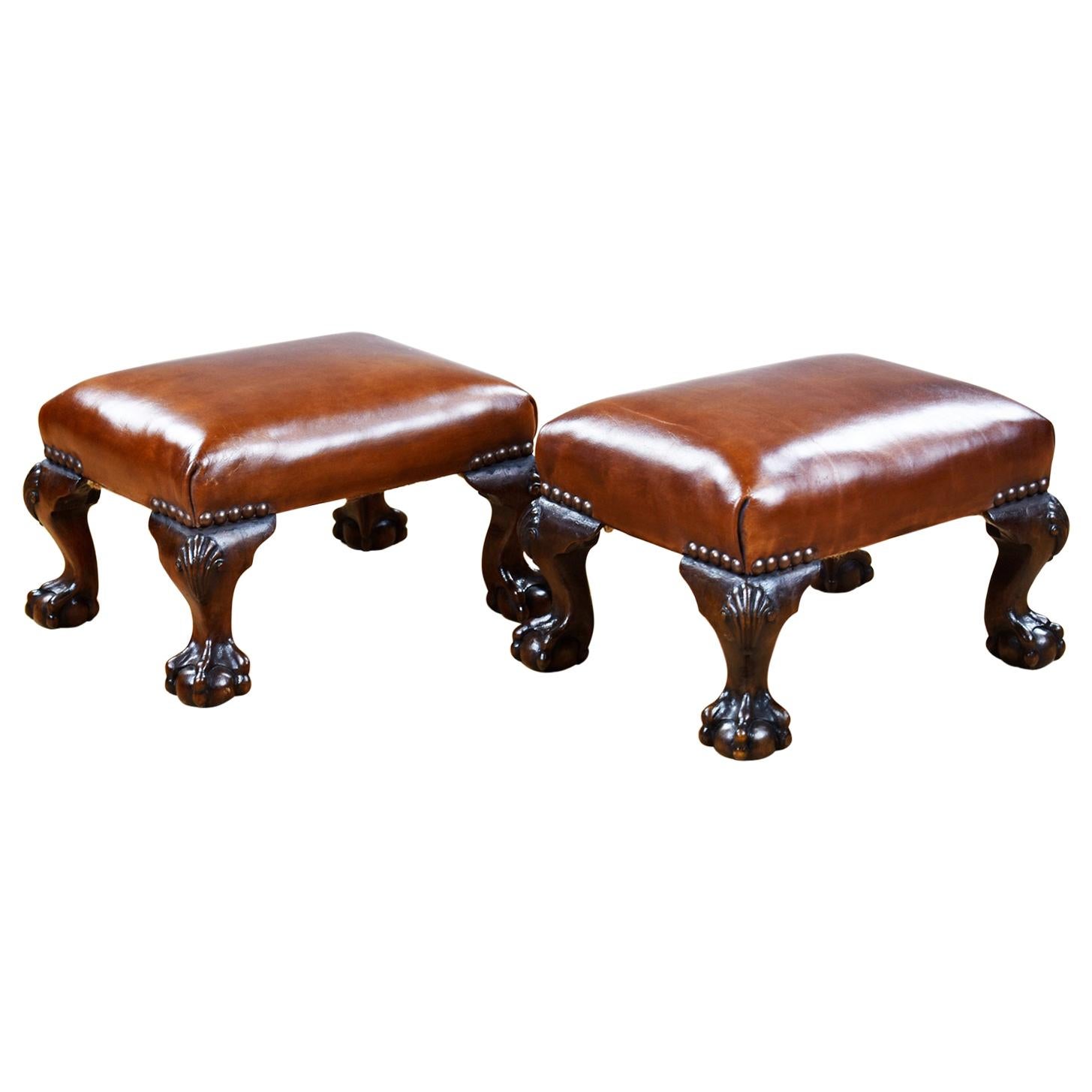 Pair of Antique Walnut Claw and Ball Footstools