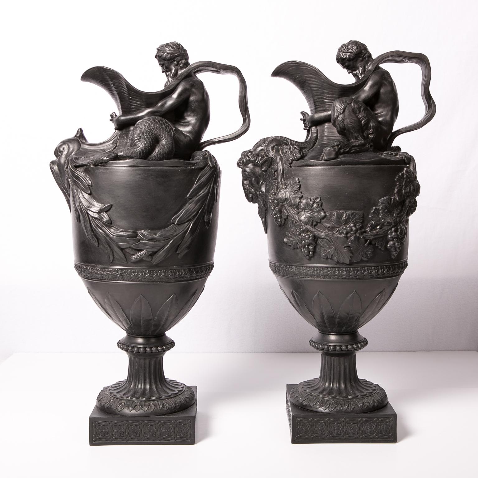 WHY WE LOVE IT: Classicalism at it's finest
We are pleased to offer this extraordinary pair of antique Wedgwood black basalt wine and water ewers named: 
