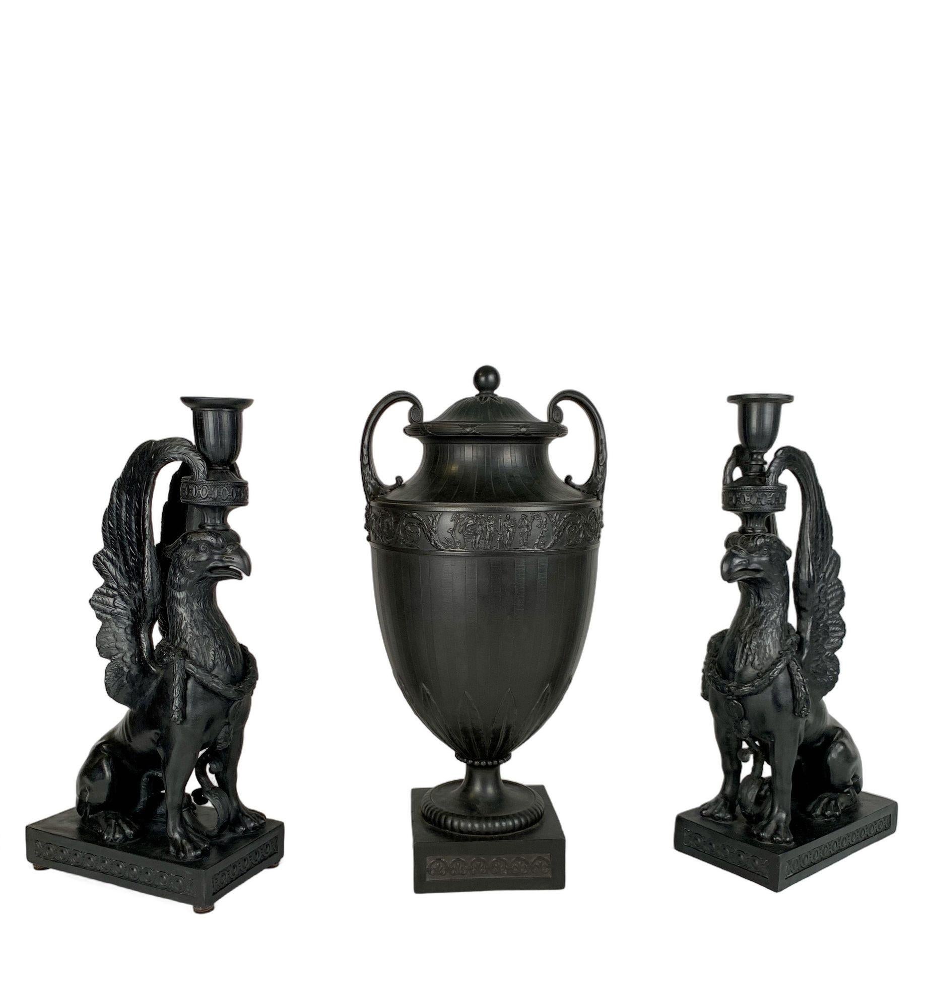 This fabulous set of early Wedgwood black basalt is a masterpiece of neoclassical craftsmanship and artistry.
The jar and the pair of black basalt griffins are all in excellent condition.
The black basalt vase shown here was made by Wedgwood and