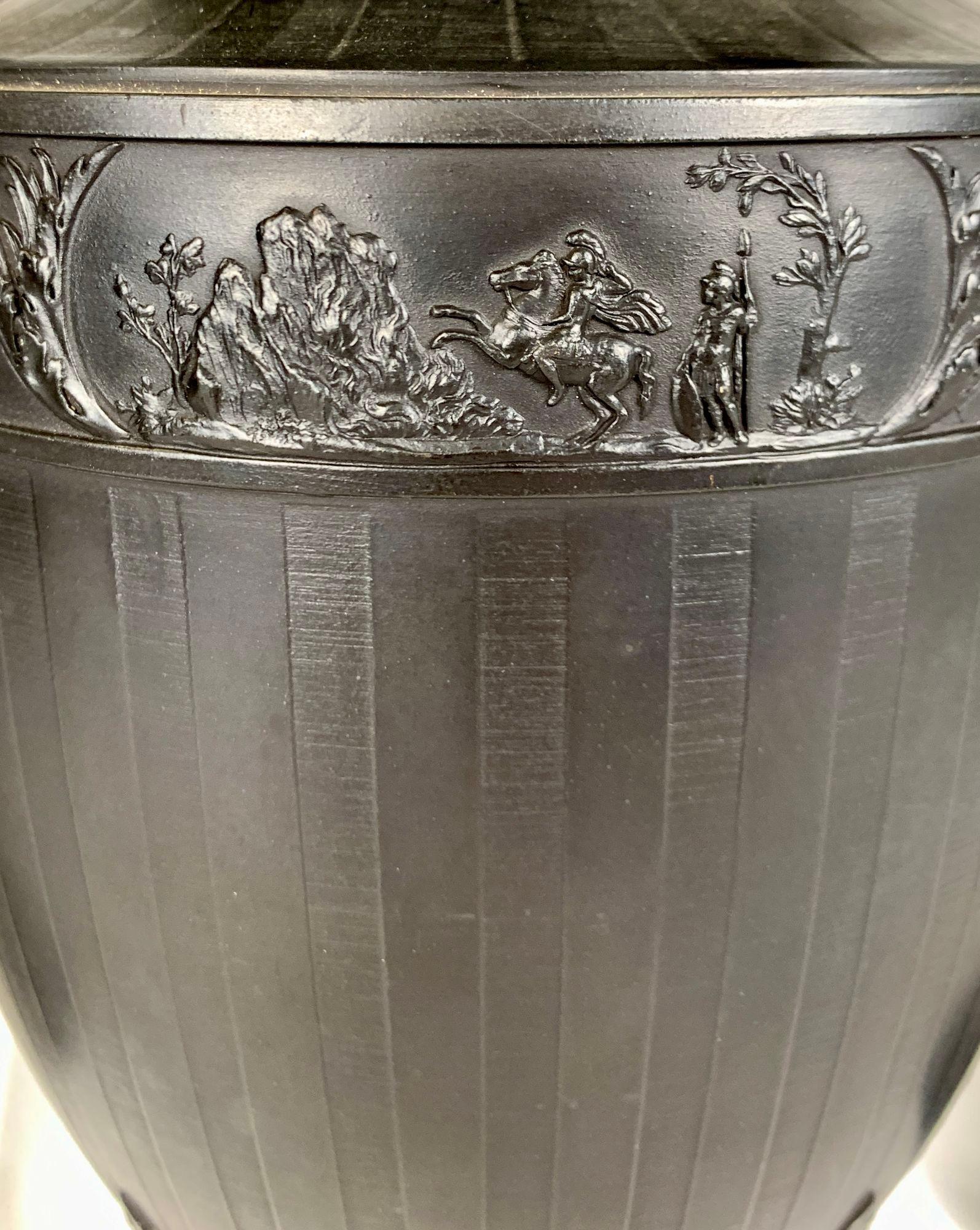 Stoneware Pair Antique Wedgwood Black Basalt Griffins Flank a Wedgwood Black Basalt Jar