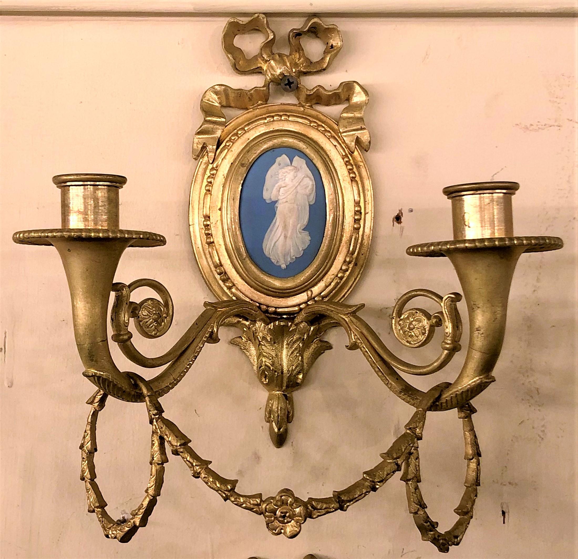 Pair of antique Wedgwood plaque and bronze wall lights.