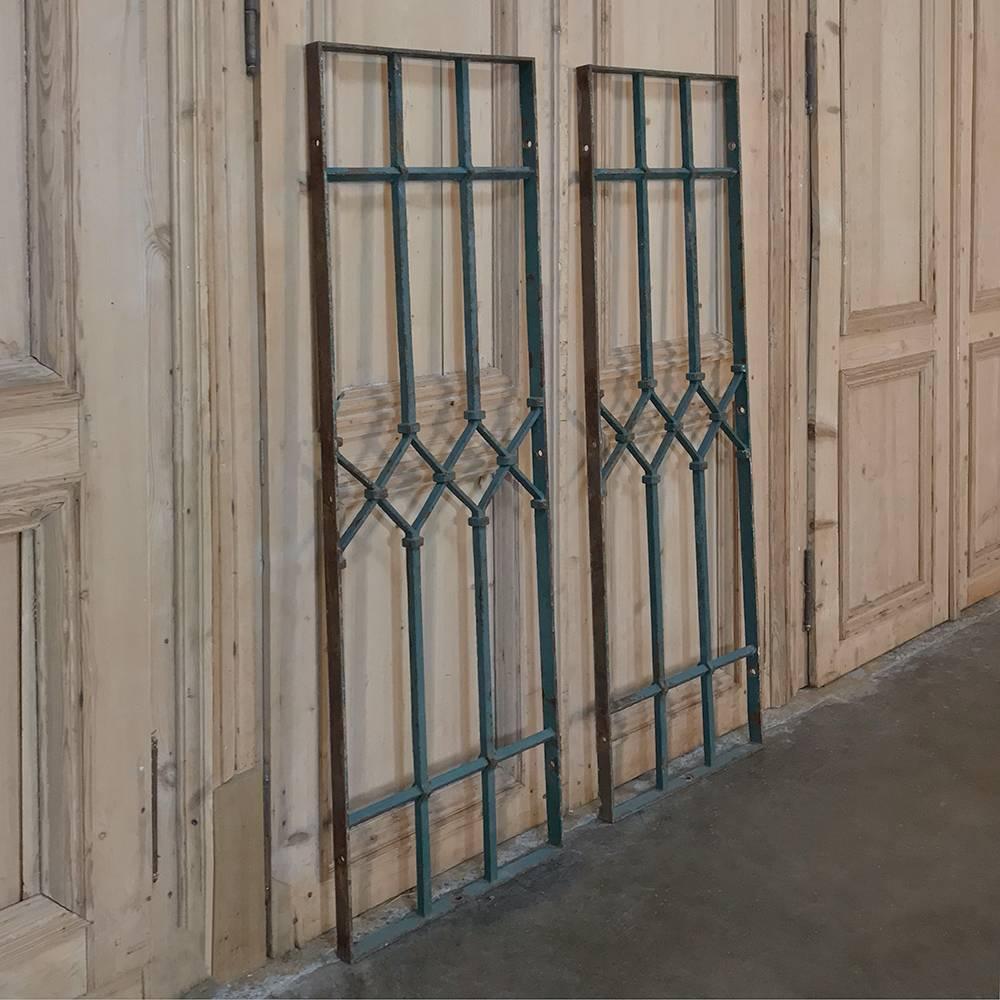 Pair of antique wrought iron panels are ideal for creating space definition, adding a little three dimensional design to a wall, or using in a balcony overlook,
circa early 1900s
Each measures 55.5 H x 18 W.