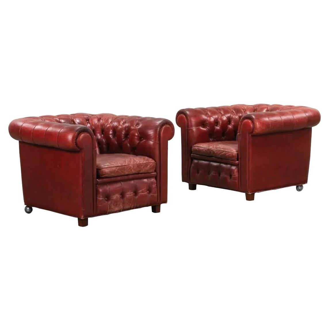 Paire de fauteuils club Chesterfield en cuir Arne Norells en vente