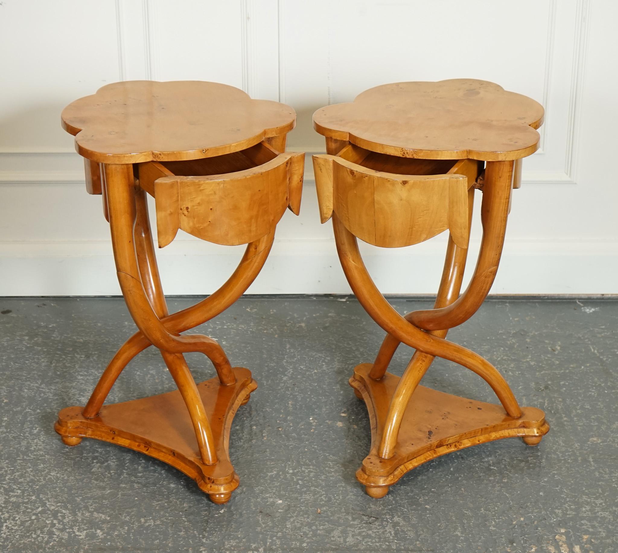 
We are delighted to offer for sale this Pair Of Art Deco Style Walnut Occasional Bedside Tables.

The Pair of Art Deco Walnut Veneer On Hardwood Occasional Bedside Nightstand Tables with Curved Legs is a delightful set that reflects the elegance