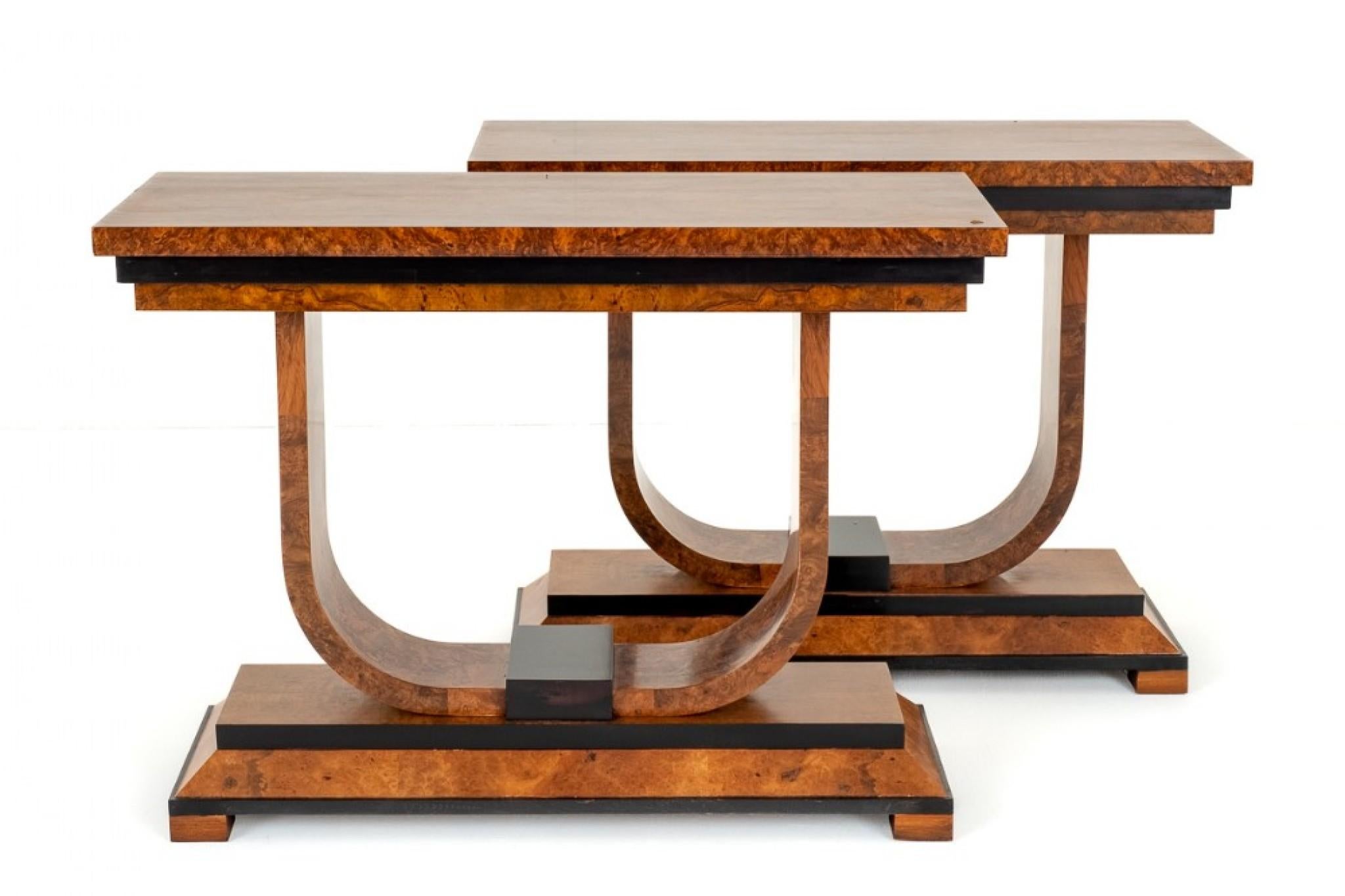 Stunning Pair of Art Deco Console Tables.
Circa 1930s
Here we Have a Wonderful Pair of Art Deco Console Tables.
These Table Feature The Usual Art Deco Themes of Shaped base and Block Feet.
The Tops of The Tables are Raised Upon Shaped Supports and