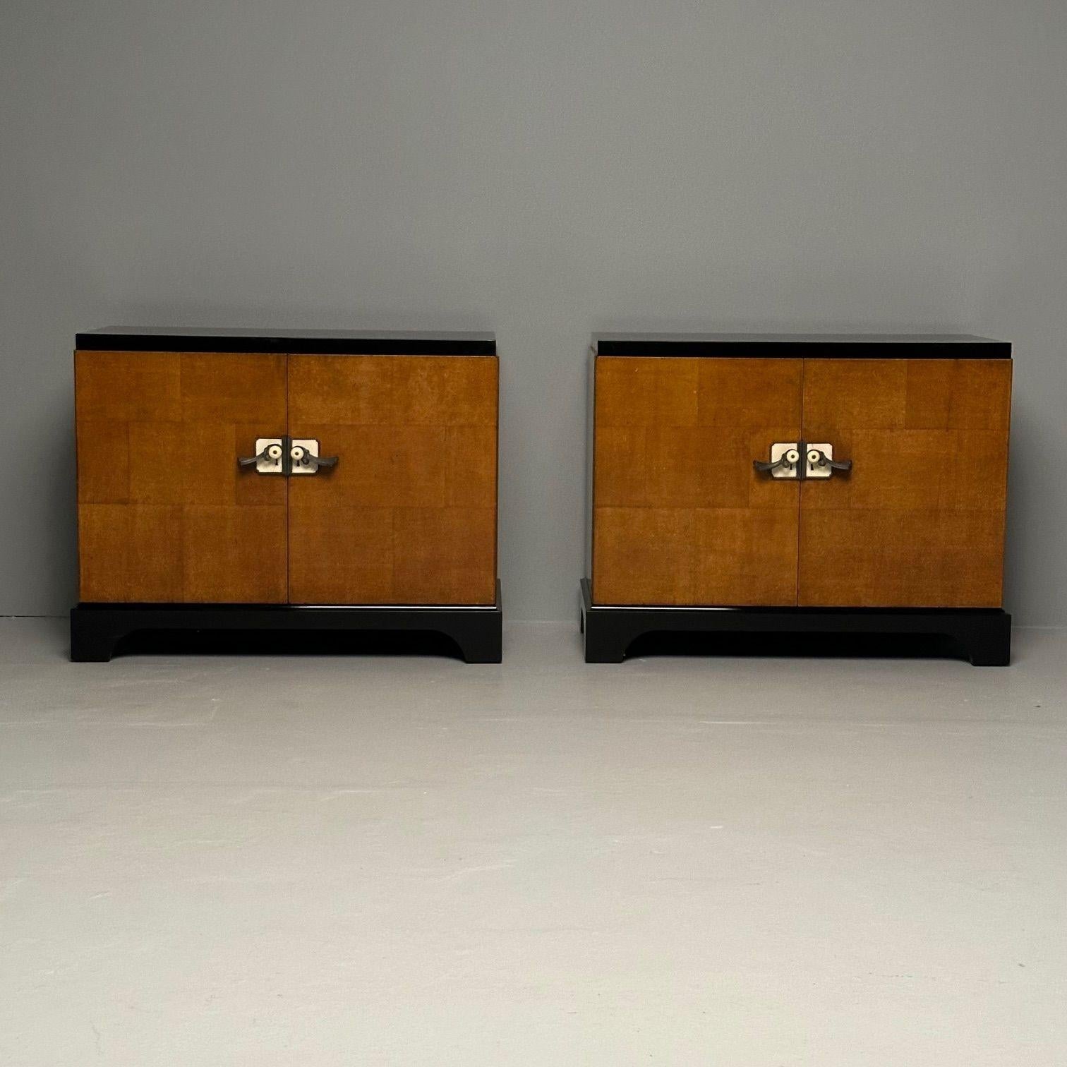 Pair of Art Deco Ebony and Parquetry Commodes, nightstands, or chests. Fully refinished.

A pair of cabinets, commodes or bedside tables on bracket ebony bases supporting a pair of open box burlwood parquetry inlaid door fronts and sides. The