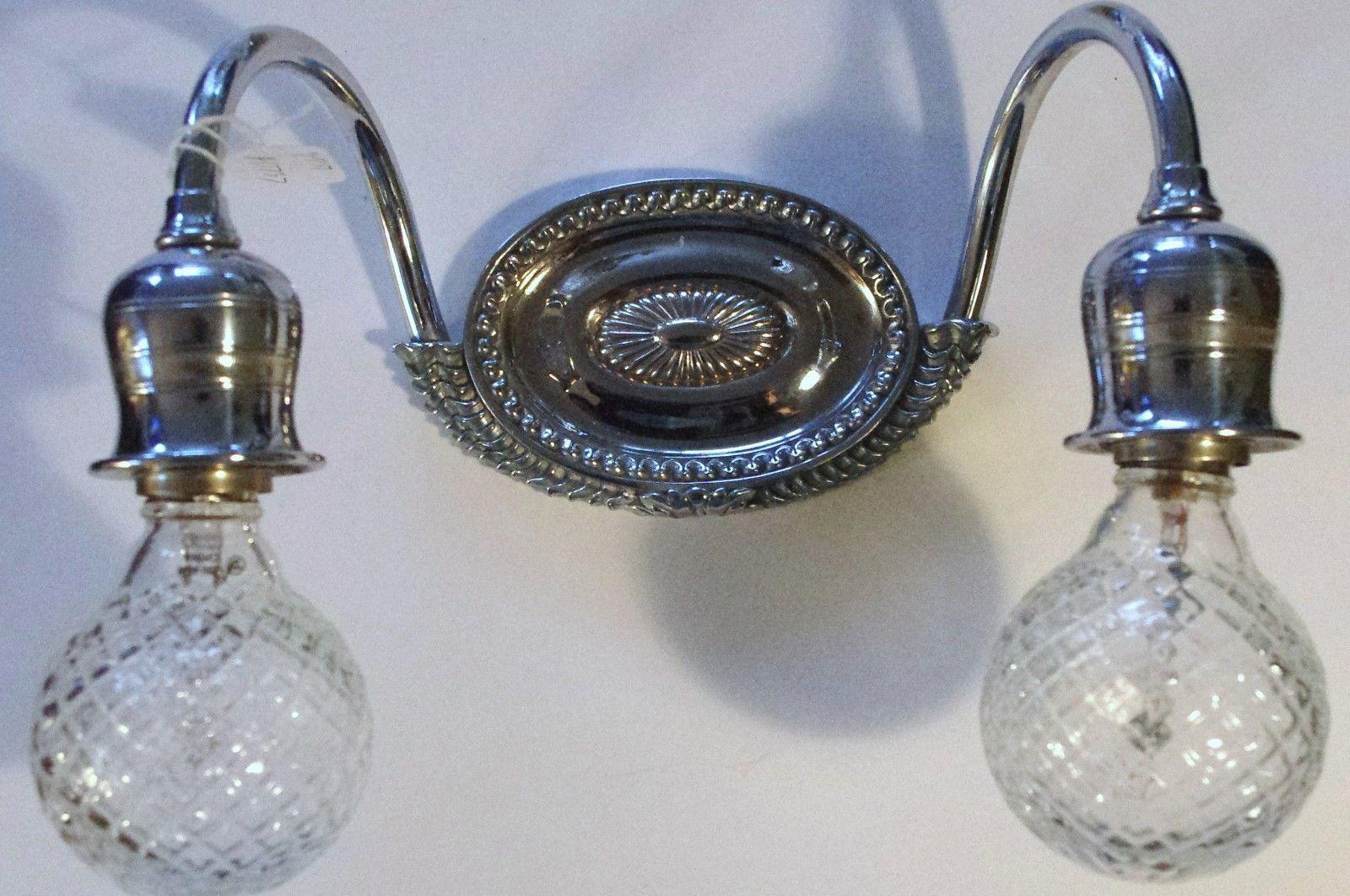 American Pair Art Deco E.F. Caldwell Nickel Wall Sconces. Signed. For Sale