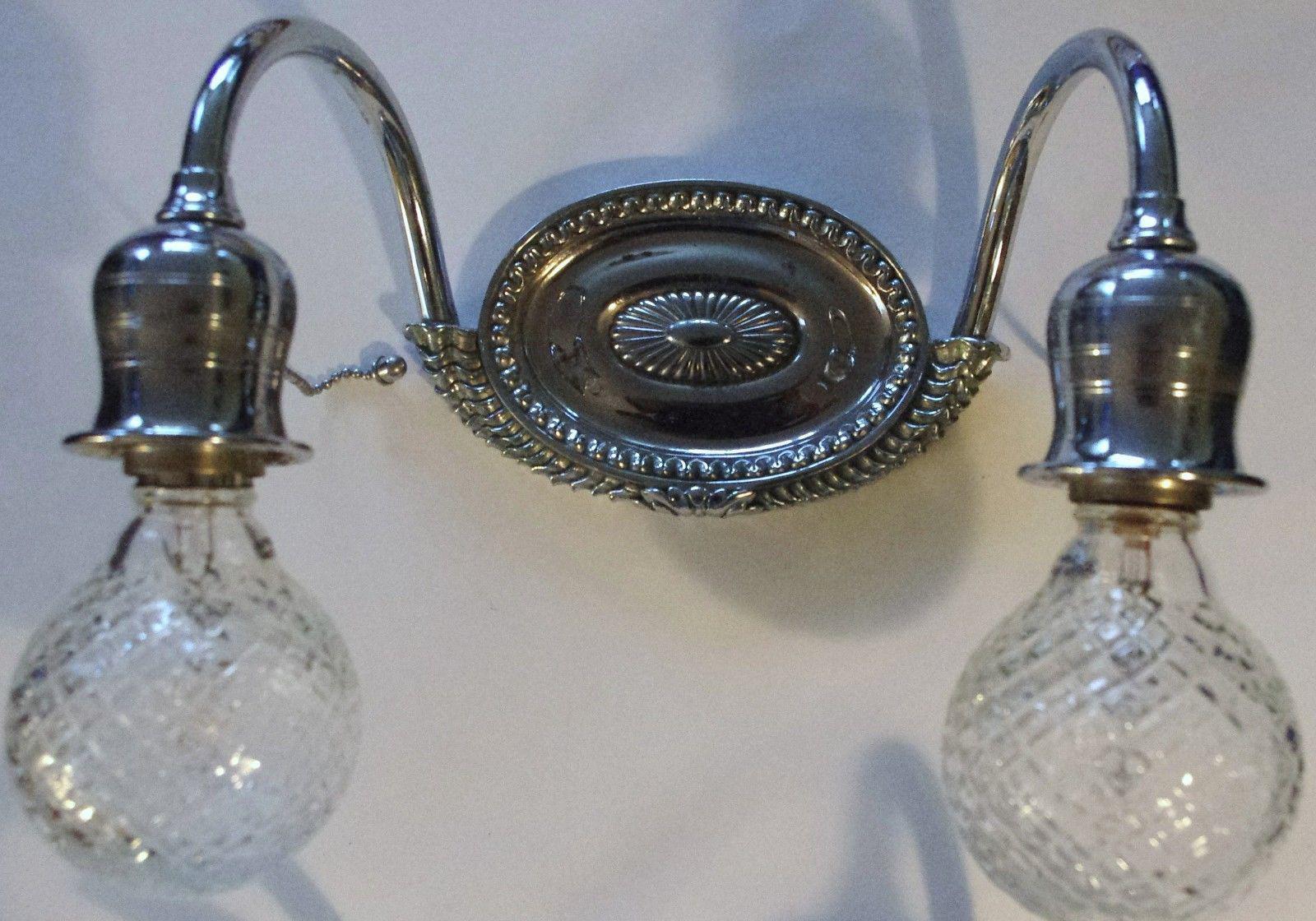 Pair Art Deco E.F. Caldwell Nickel Wall Sconces. Signed. In Good Condition For Sale In Opa Locka, FL