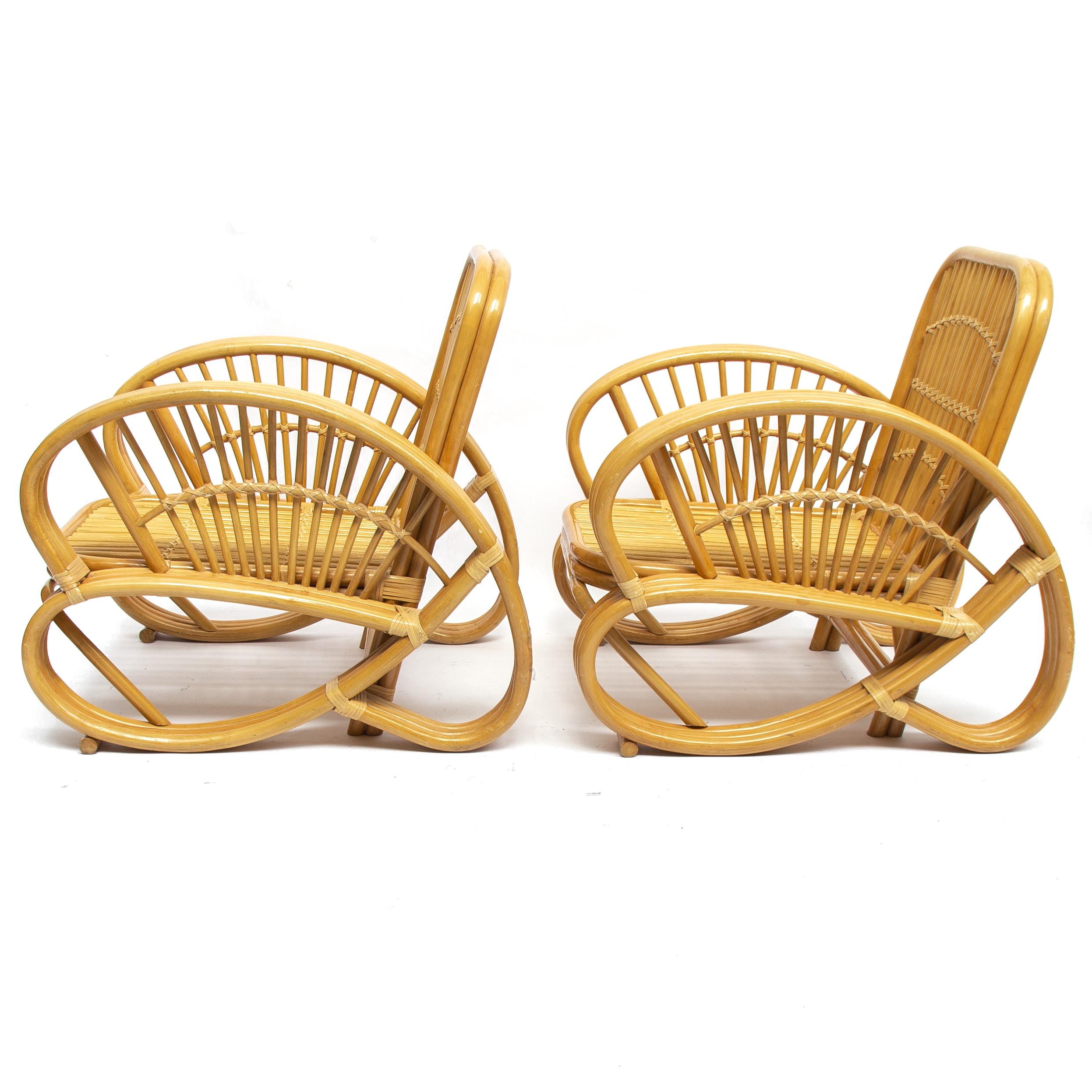 Original handcrafted bamboo patio or greenhouse chairs originally imported from Indonesia in the 1970s

The curve shapes and style resemble a Paul Frankl design. 

Perfect loungy comfort with any type of cushions of your own style. Perfect for