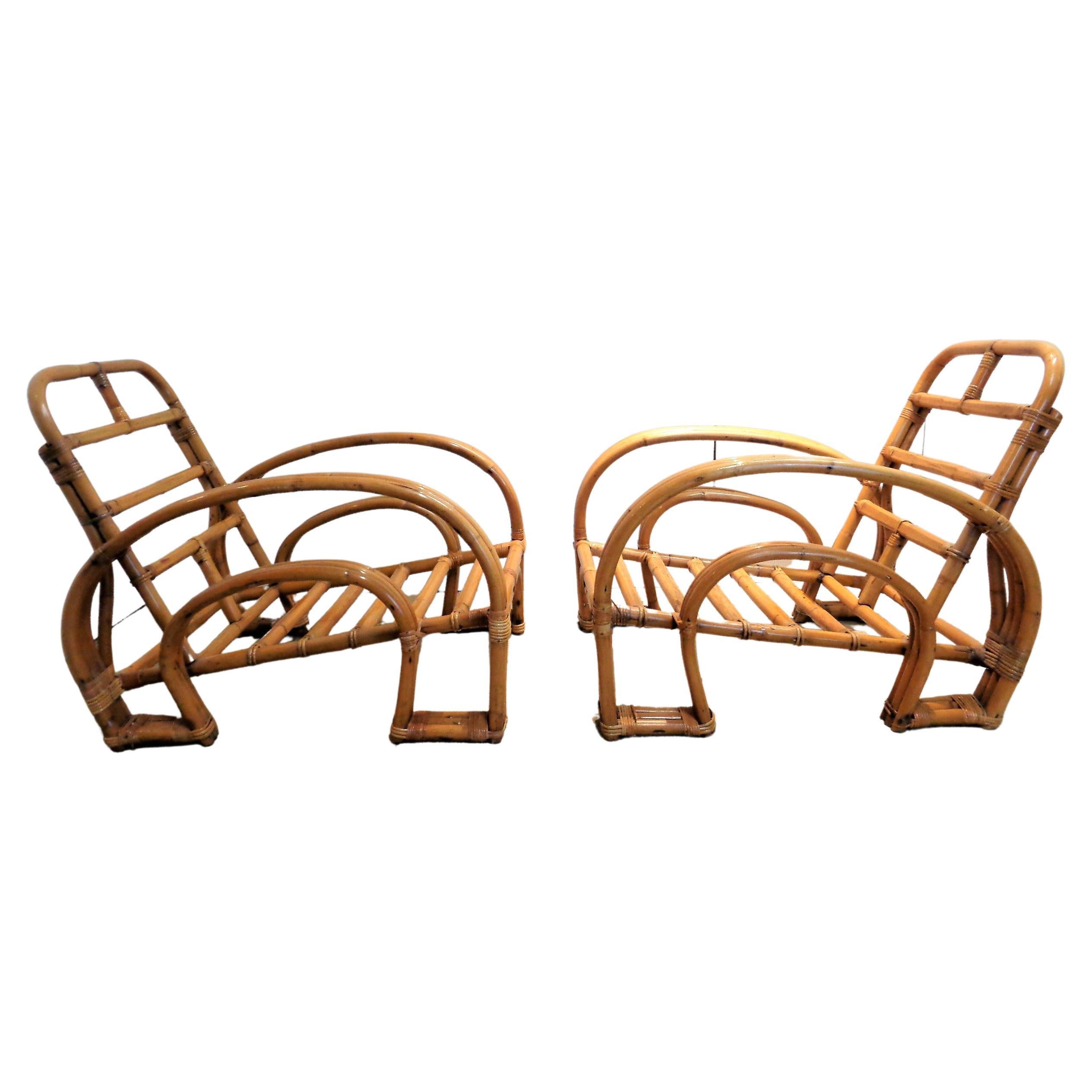 Exceptional pair of Art Deco three strand rattan and cane double horseshoe lounge chairs in beautifully aged original glowing surface color. Attributed to Paul Frankl, circa 1940-1950. Chairs measure 30