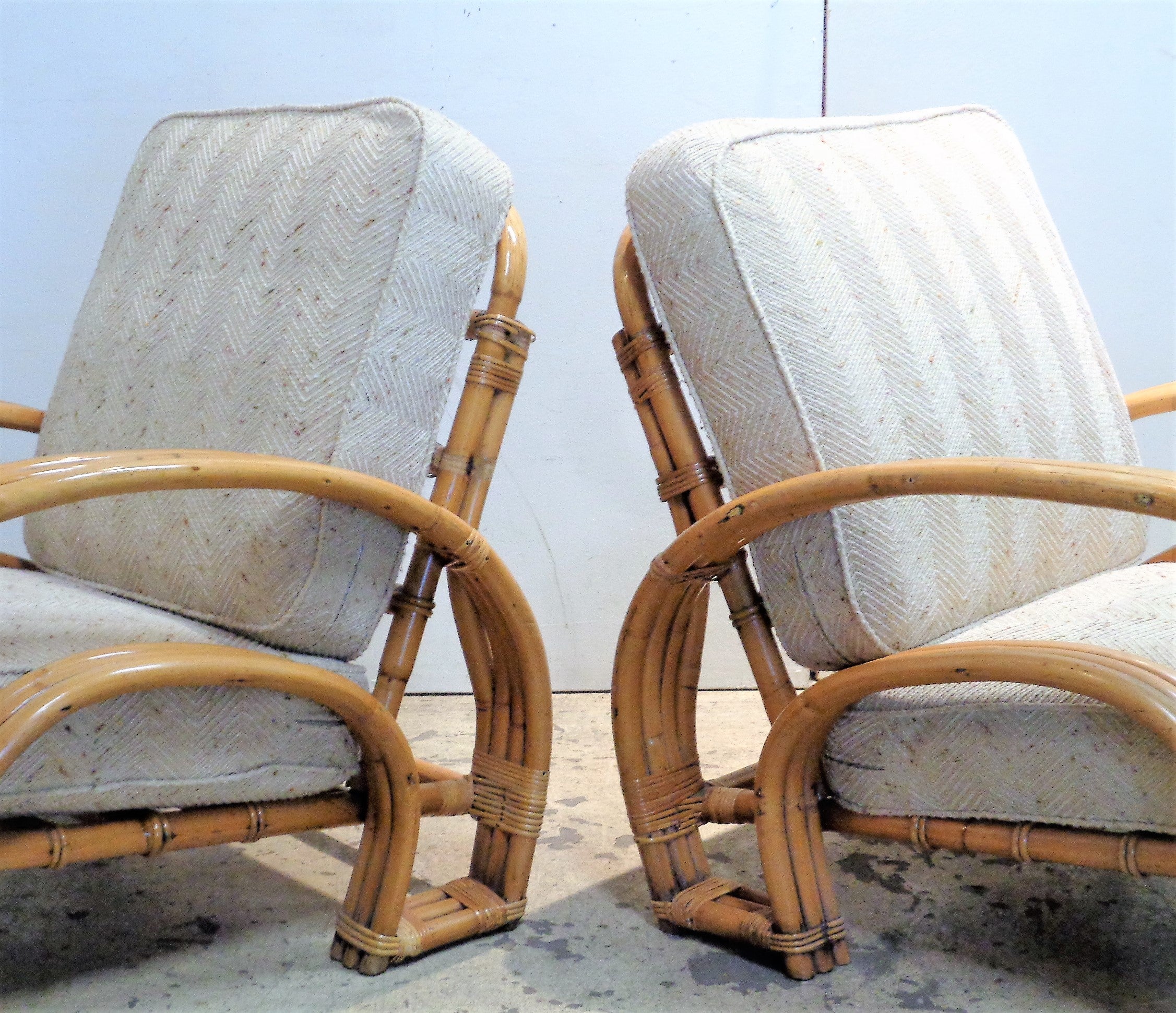 Mid-20th Century  Rattan Double Horseshoe Lounge Chairs For Sale