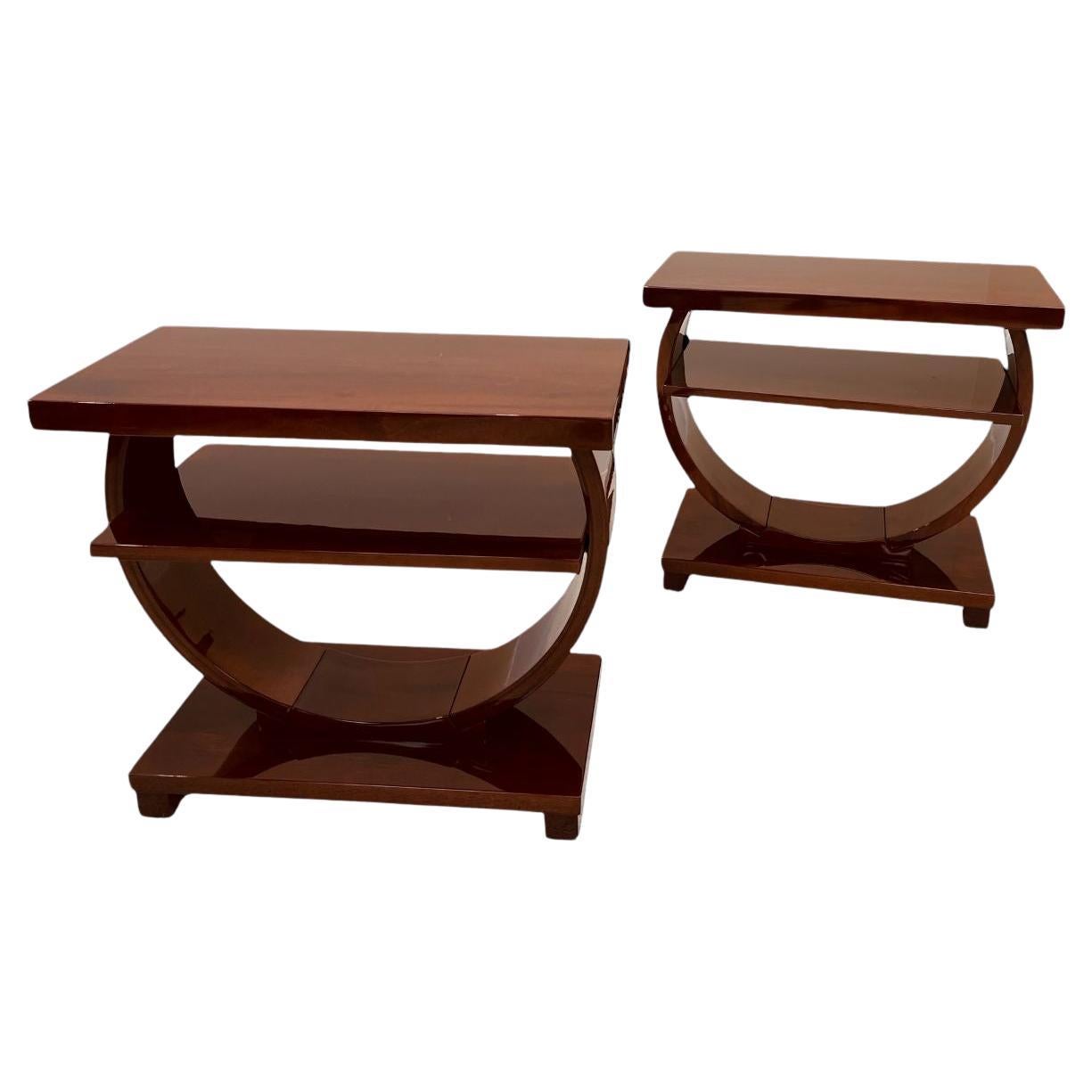 This stunning  Art Deco Machine Age table was retailed by The Modernage Furniture Company in the 1930’s and 1940’s. It features an elegant circular design that supports a rectangular base, shelf and top. This piece is sure to delight collectors of